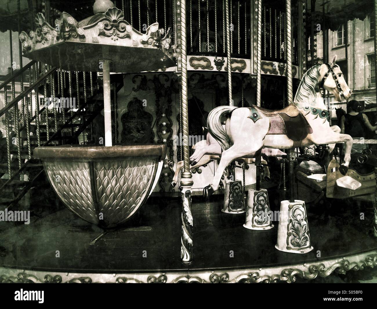 Carousel for children at a square. - Smartphone Captured Stock Image