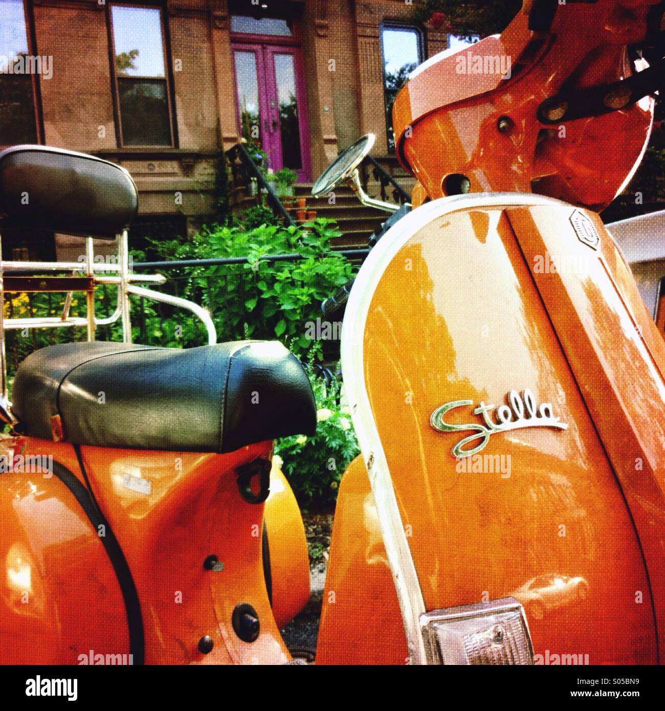 Scooter Stella parked in a quite Park Slope street in Brooklyn, New York - Smartphone Captured Stock Image