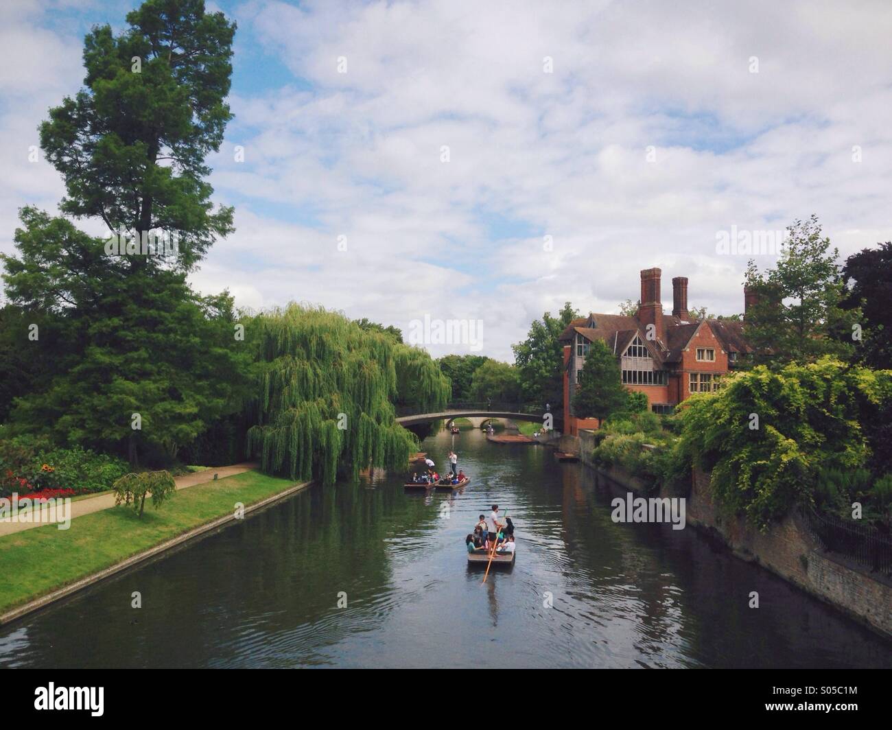 Punting on the River Cam, passing through Clare College Bridge. Cambridge. - Smartphone Captured Stock Image