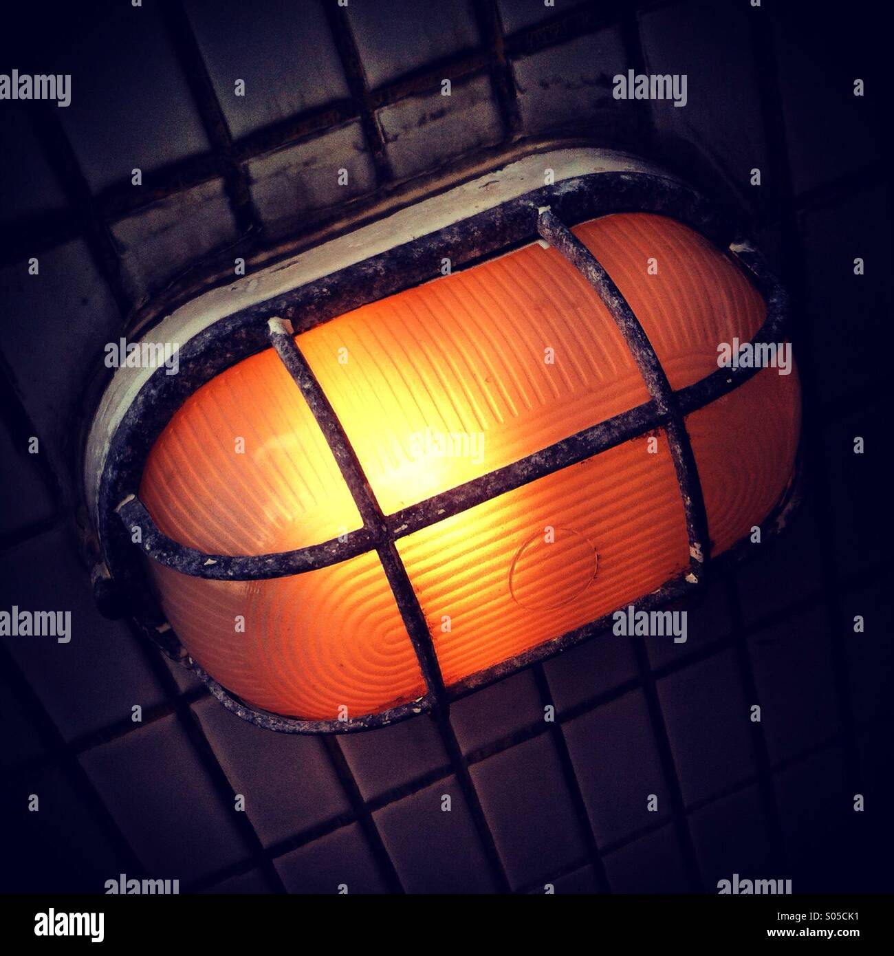 It's a photo of an outdoor light which is on. - Smartphone Captured Stock Image