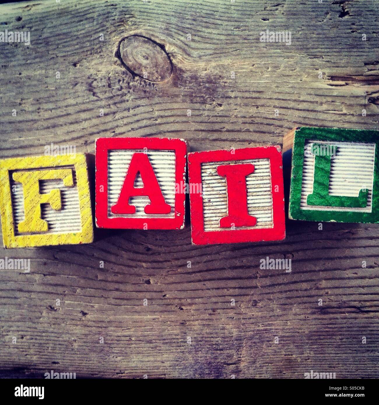It's a photo of few wood blocks with colored letters on them that are combined together to create the word FAIL - Smartphone Captured Stock Image