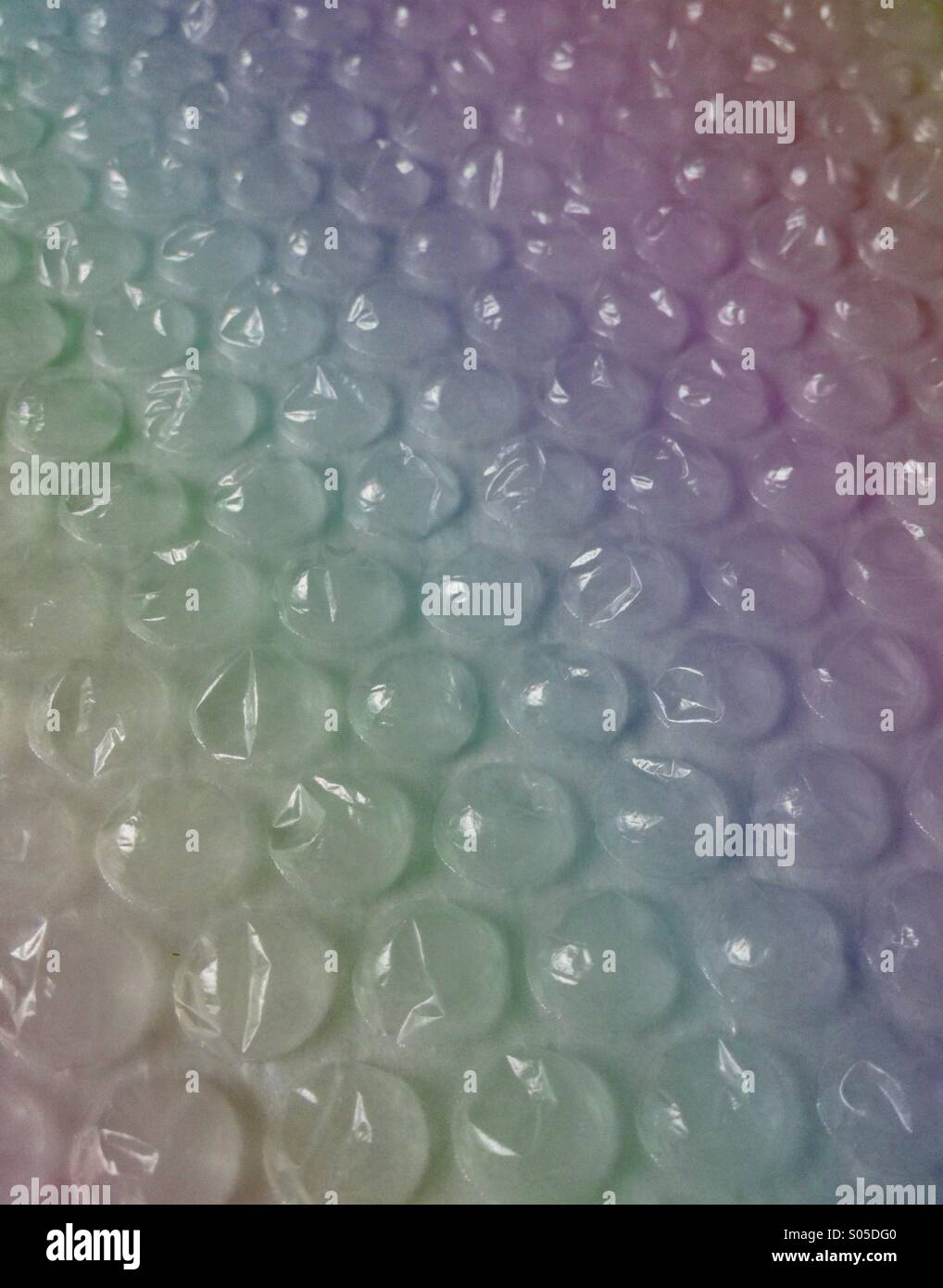 Bubble wrap with rainbow effect - Smartphone Captured Stock Image