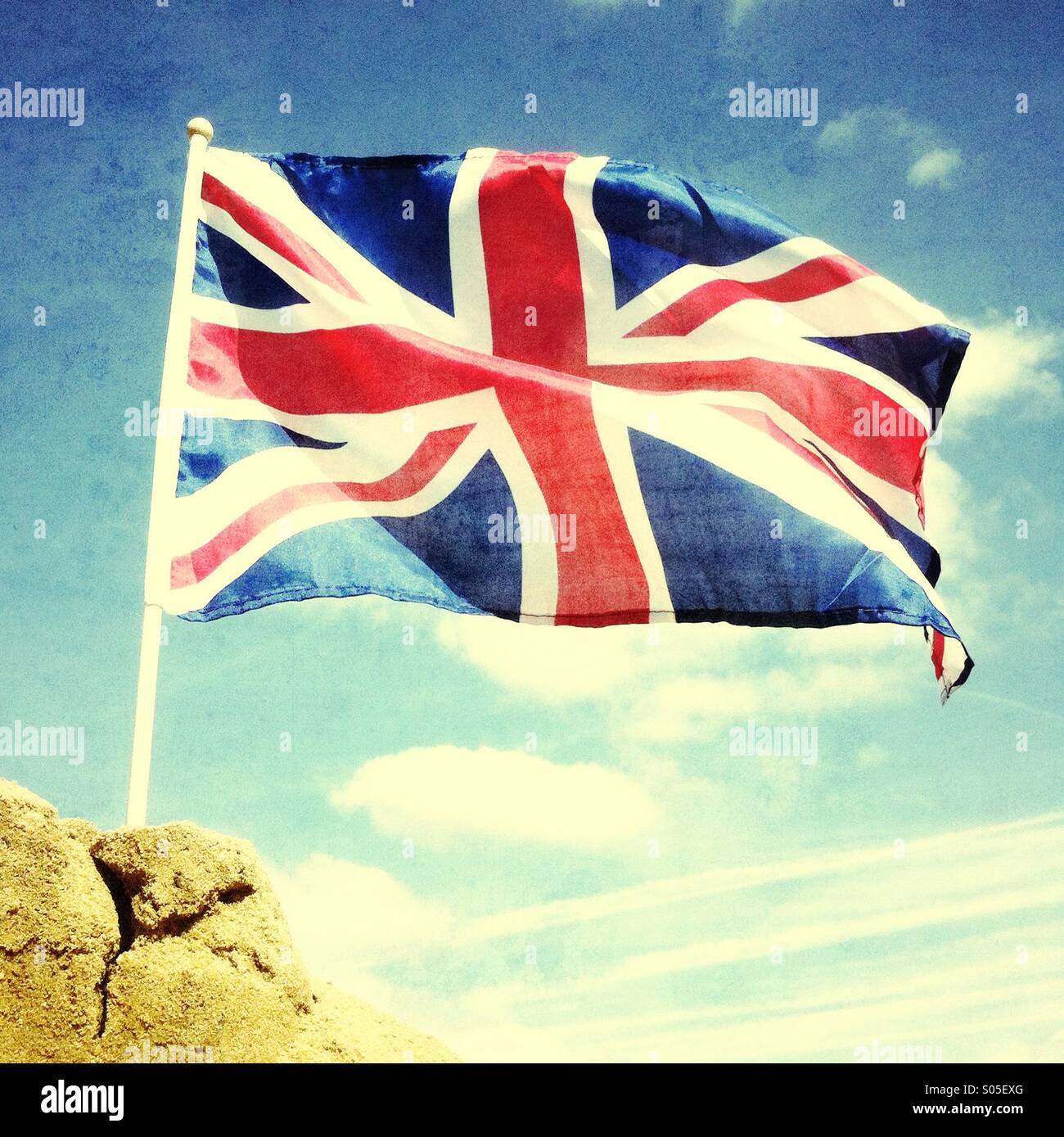 Union Jack flag on a sandcastle - Smartphone Captured Stock Image