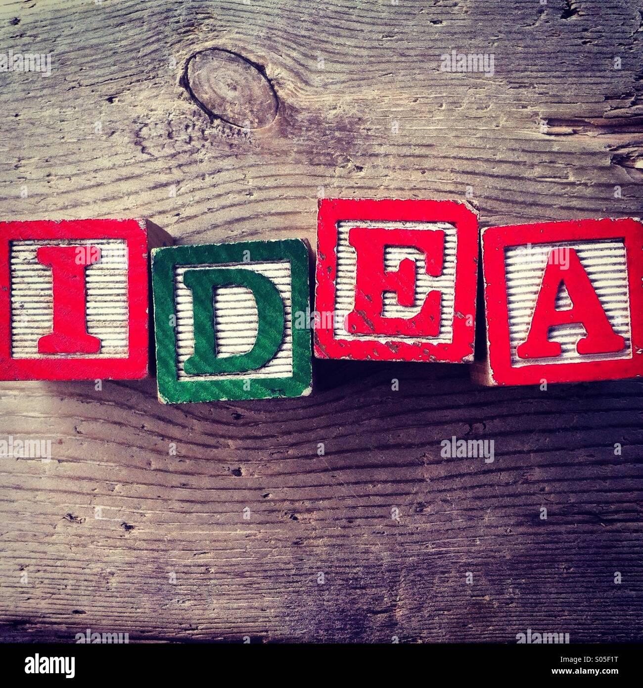 It's a photo of few wood blocks with letter on them that are combined together to create the word IDEA Stock Photo