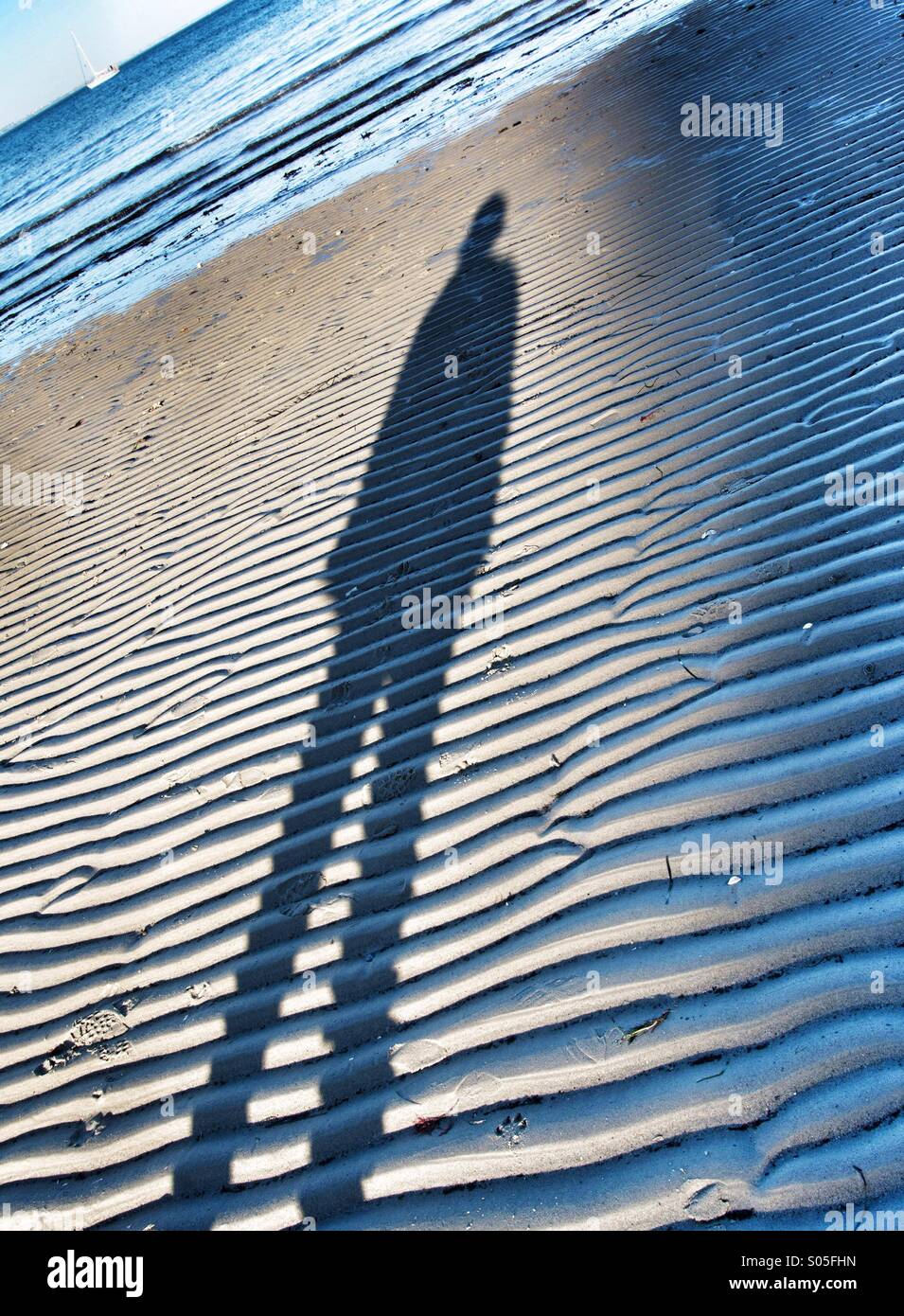 Shadow on a sandy beach - Smartphone Captured Stock Image