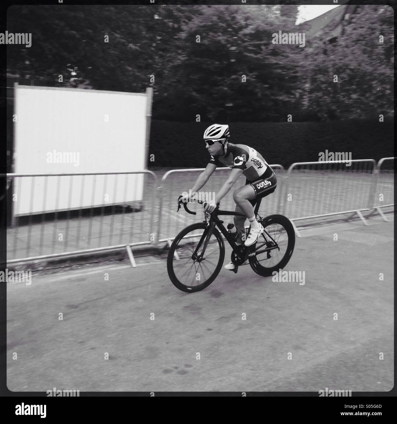 Competitor in a cycling road race (criterium). Stock Photo