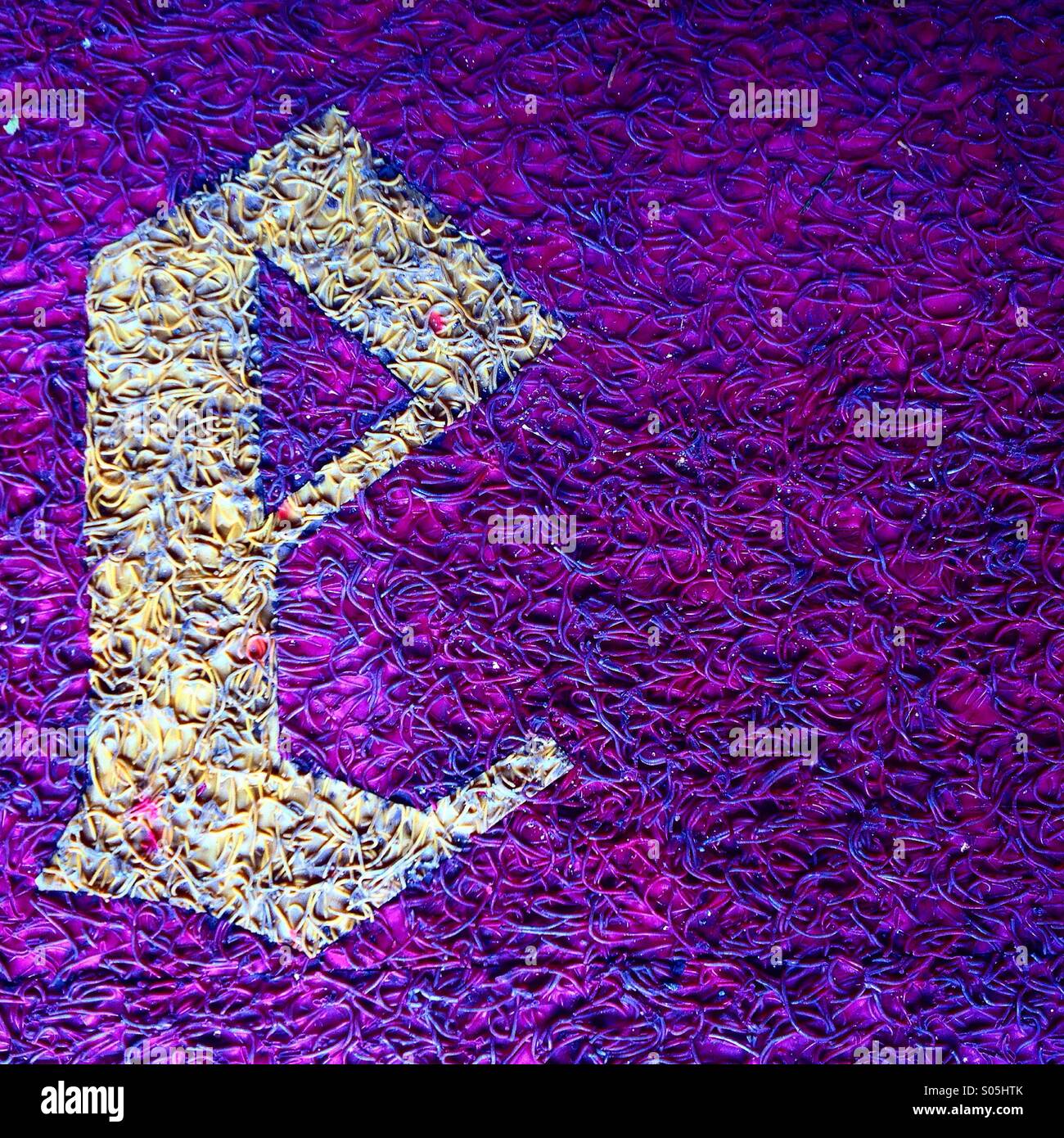 A letter E decorates a carpet in Queretaro, Mexico - Smartphone Captured Stock Image