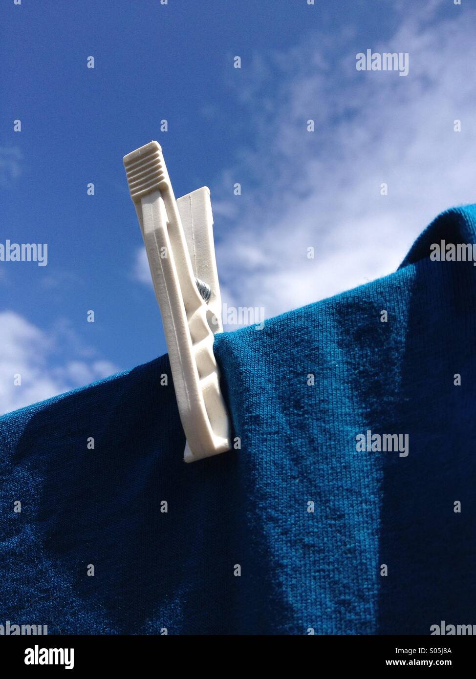 Close up of a peg on a washing line Stock Photo