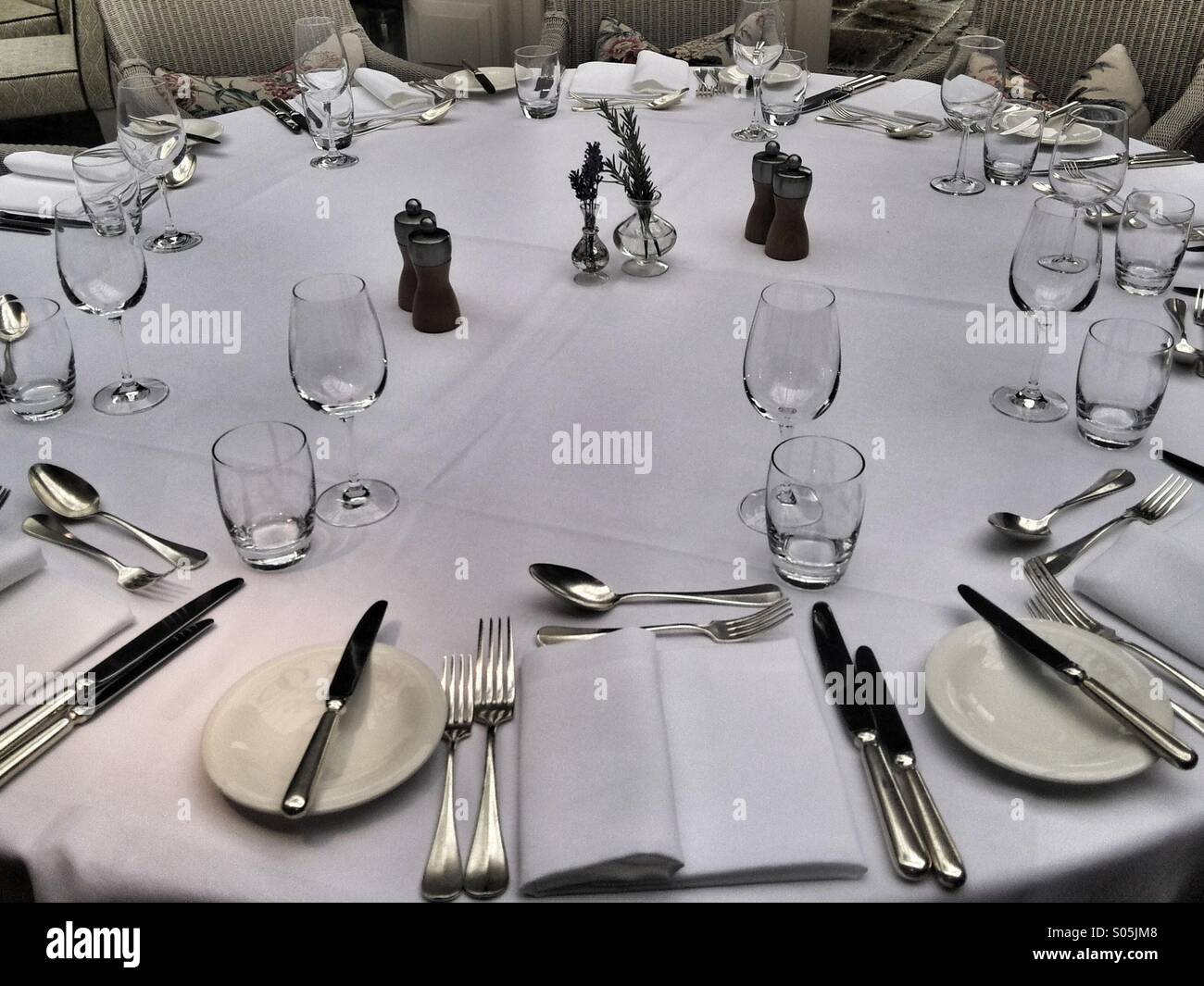 Round table in a restaurant. Mobile phone photo with some phone or tablet post processing. - Smartphone Captured Stock Image