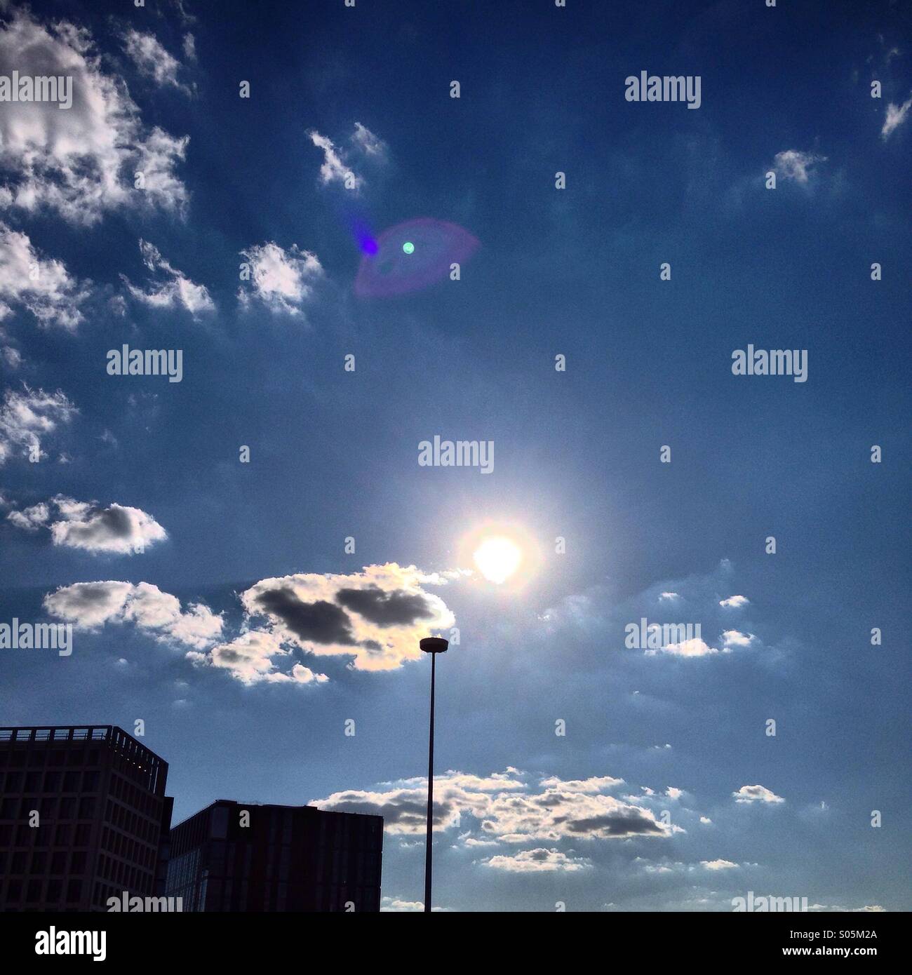 sun shining over Kings Place, near King's Cross, London Stock Photo Alamy