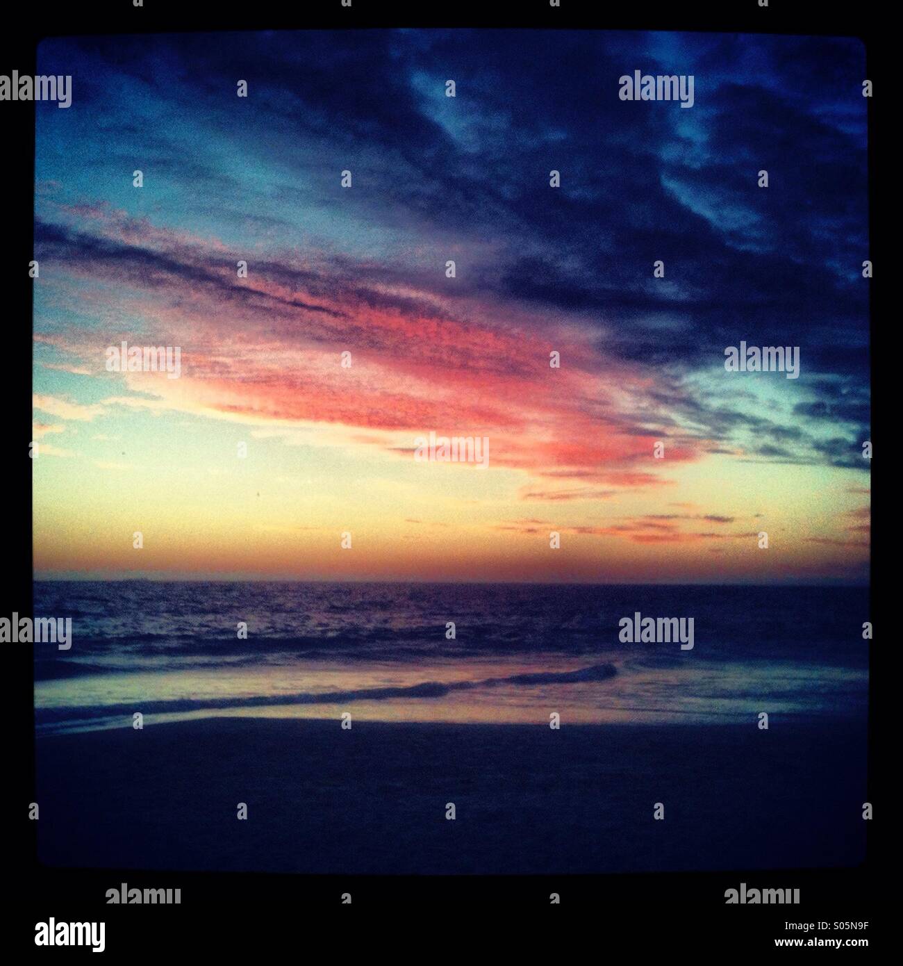 Colourful sunset on Scarborough beach in Perth, Western Australia - Smartphone Captured Stock Image