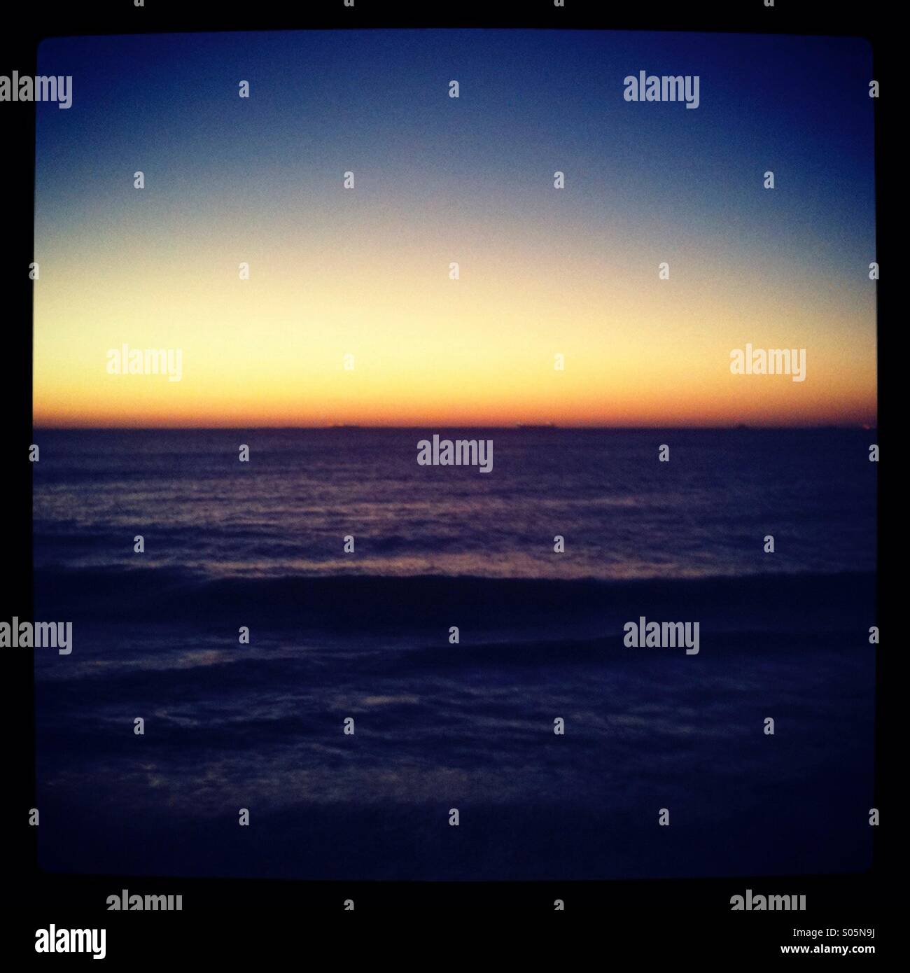 Sunset over water. Scarborough Beach, Perth, Western Australia - Smartphone Captured Stock Image