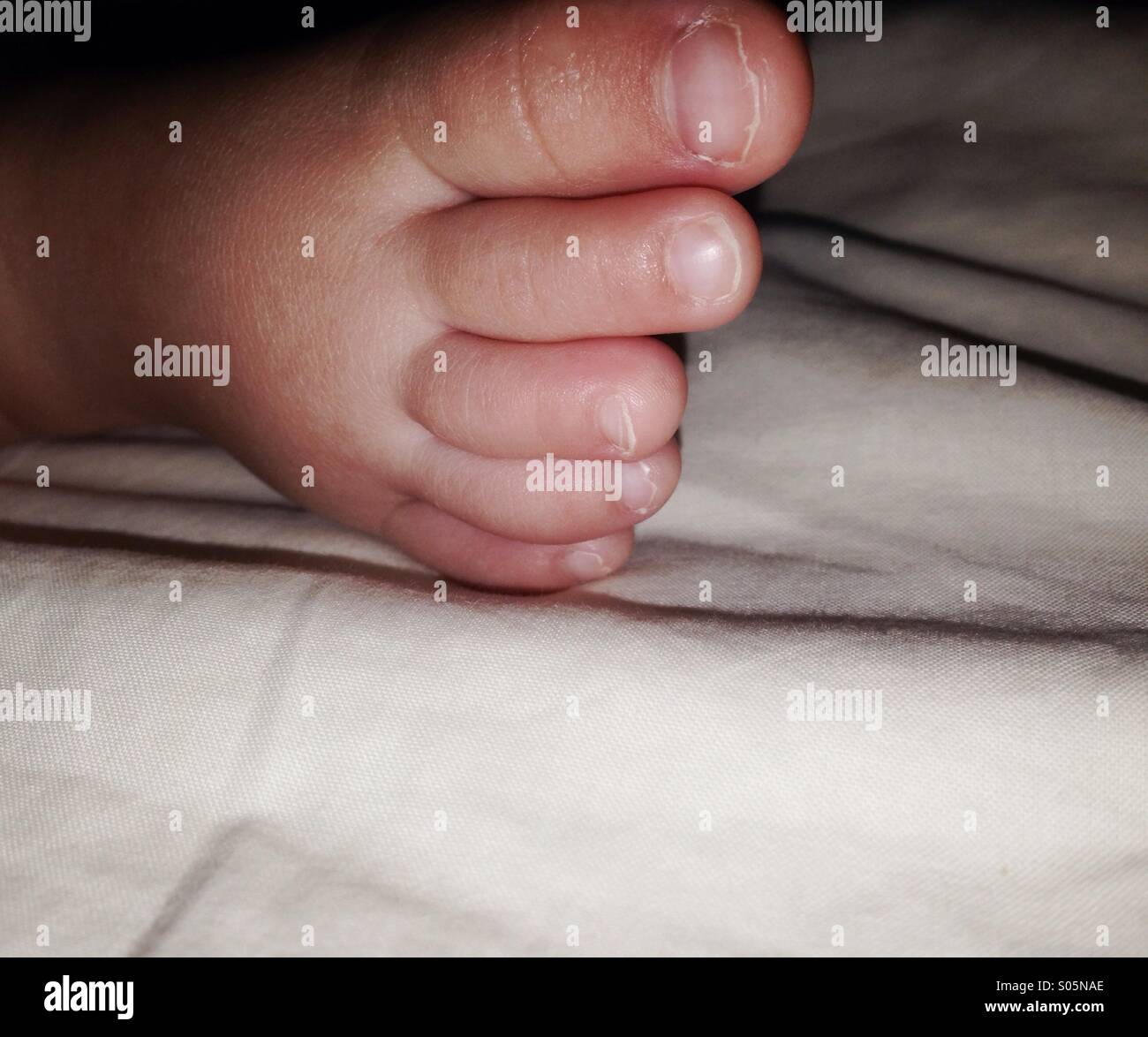 Foot of a sleeping baby Stock Photo Alamy