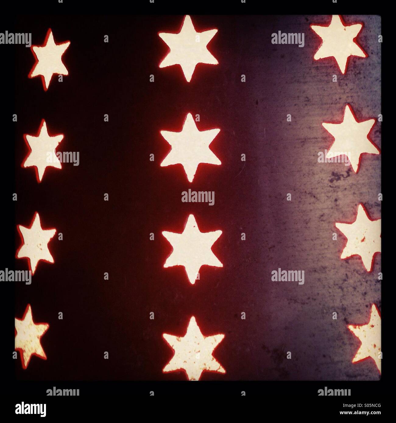 Glowing star shapes in metal - Smartphone Captured Stock Image