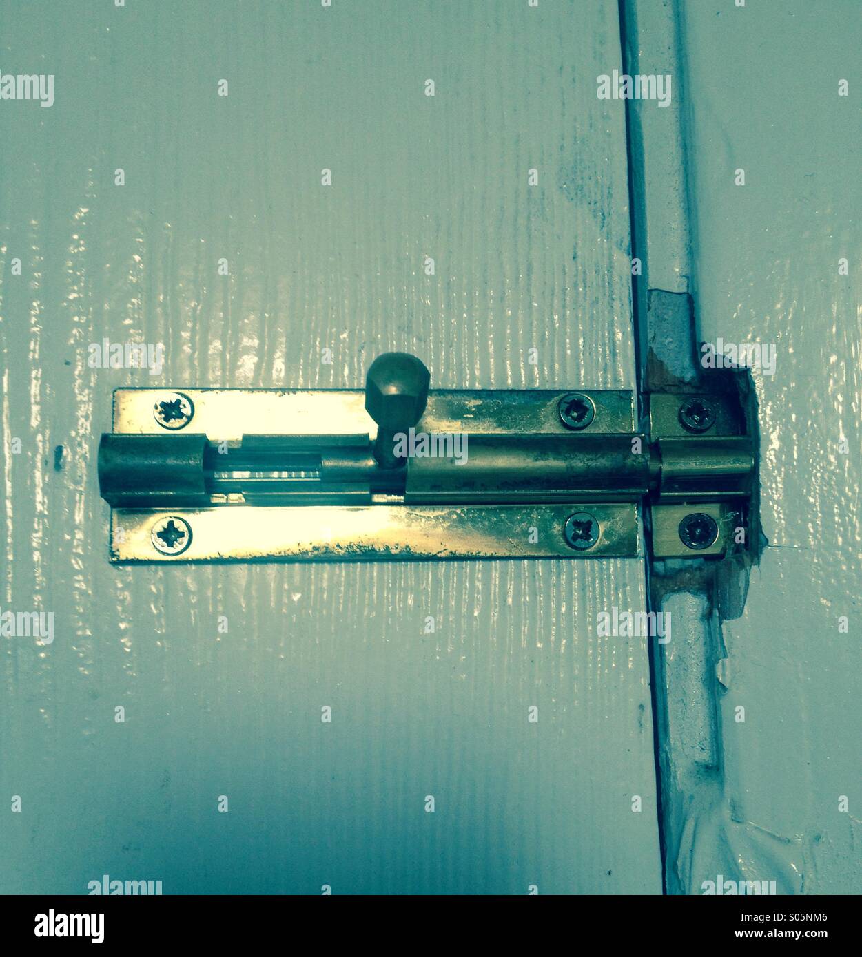 Door latch dead bolt - Smartphone Captured Stock Image