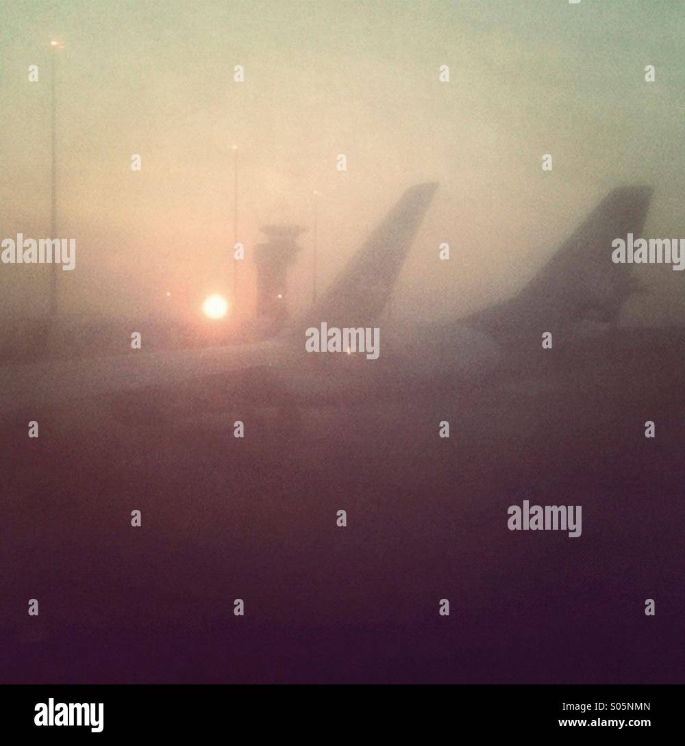 Planes at the airport in the most and fog. Darwin, Northern Territory, Australia Stock Photo