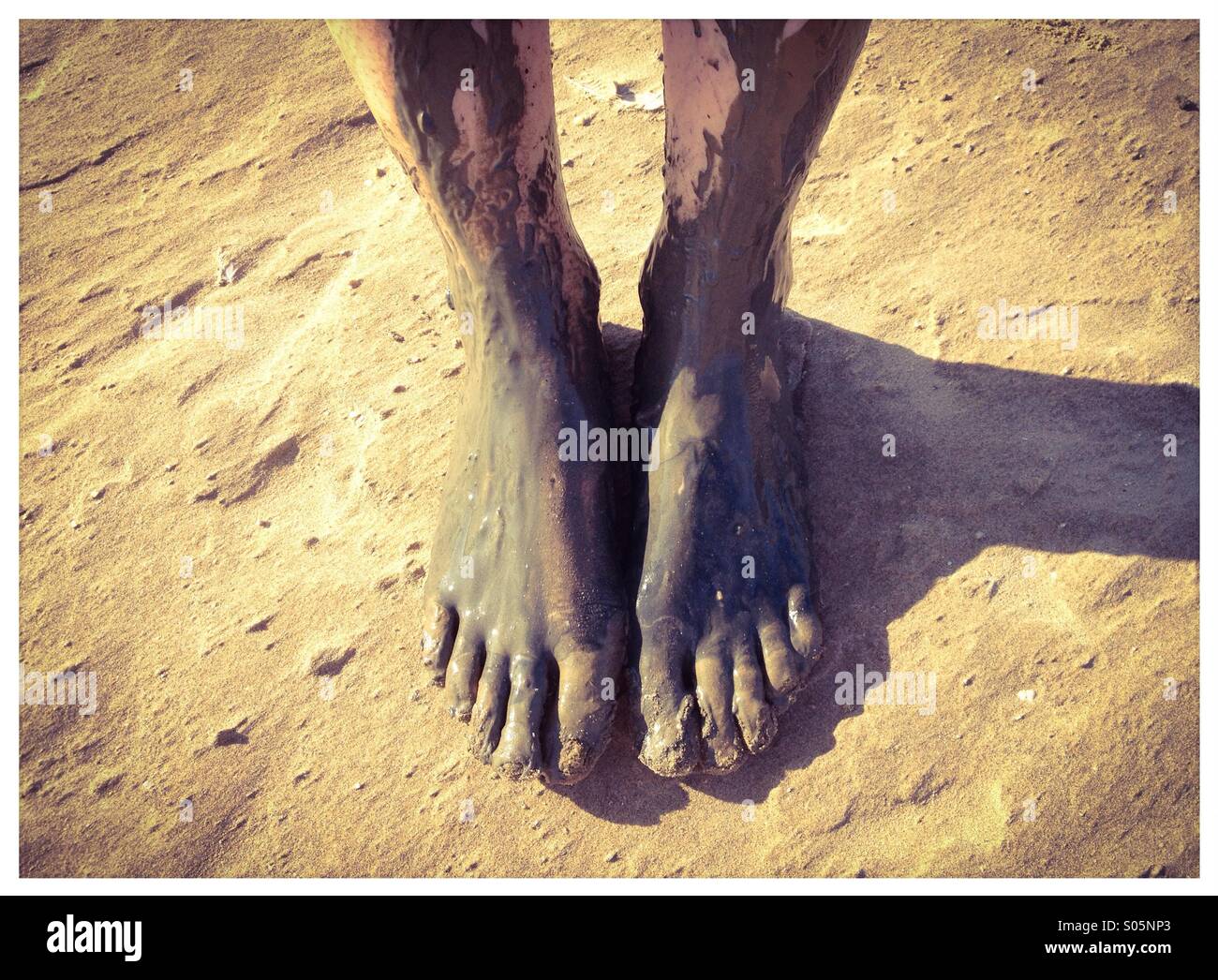 Muddy feet Stock Photo