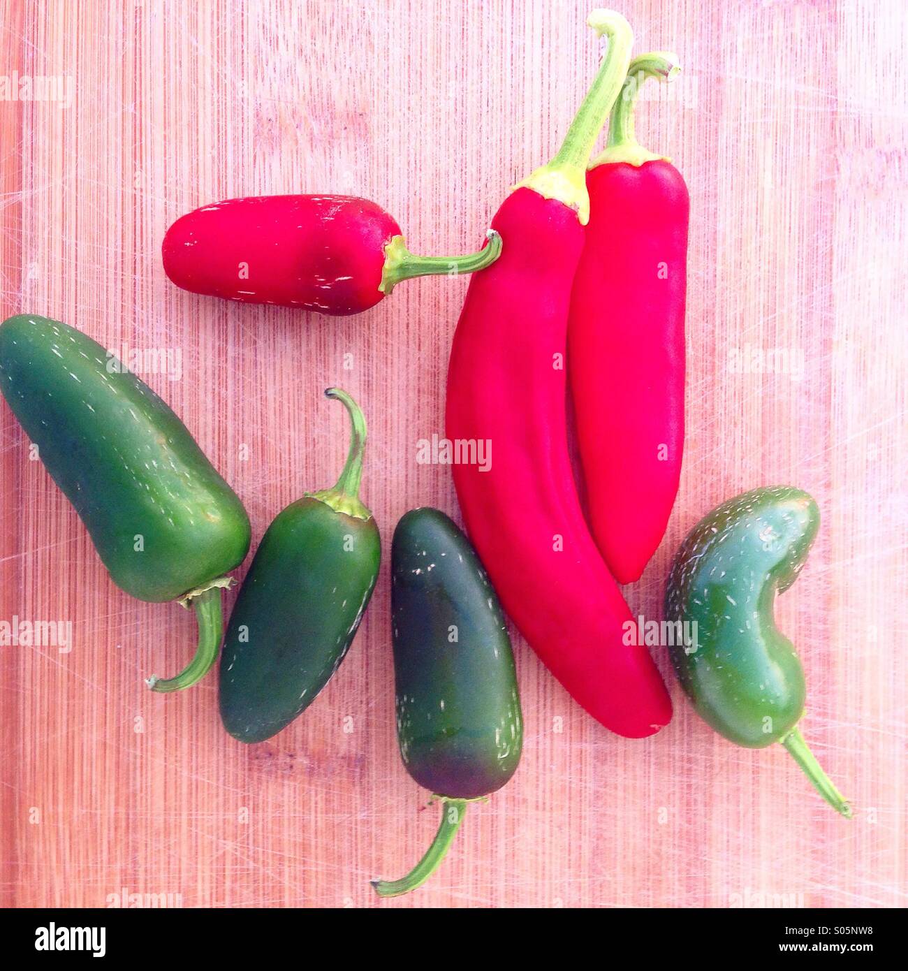 Green jalapeno and chili peppers Stock Photo