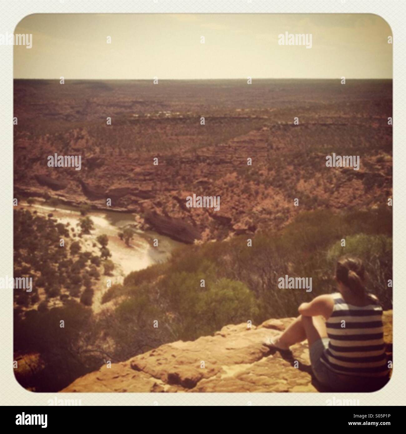 Young Female looking at the view in Cape Range National Park, Western Australia - Smartphone Captured Stock Image