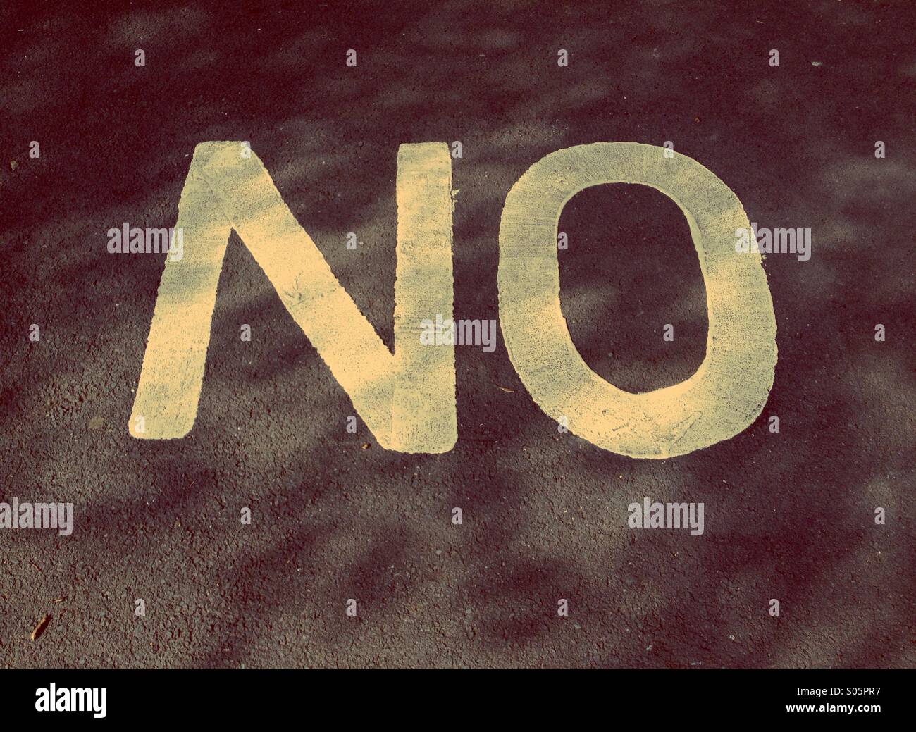 Close up of the word 'NO' on pavement Stock Photo