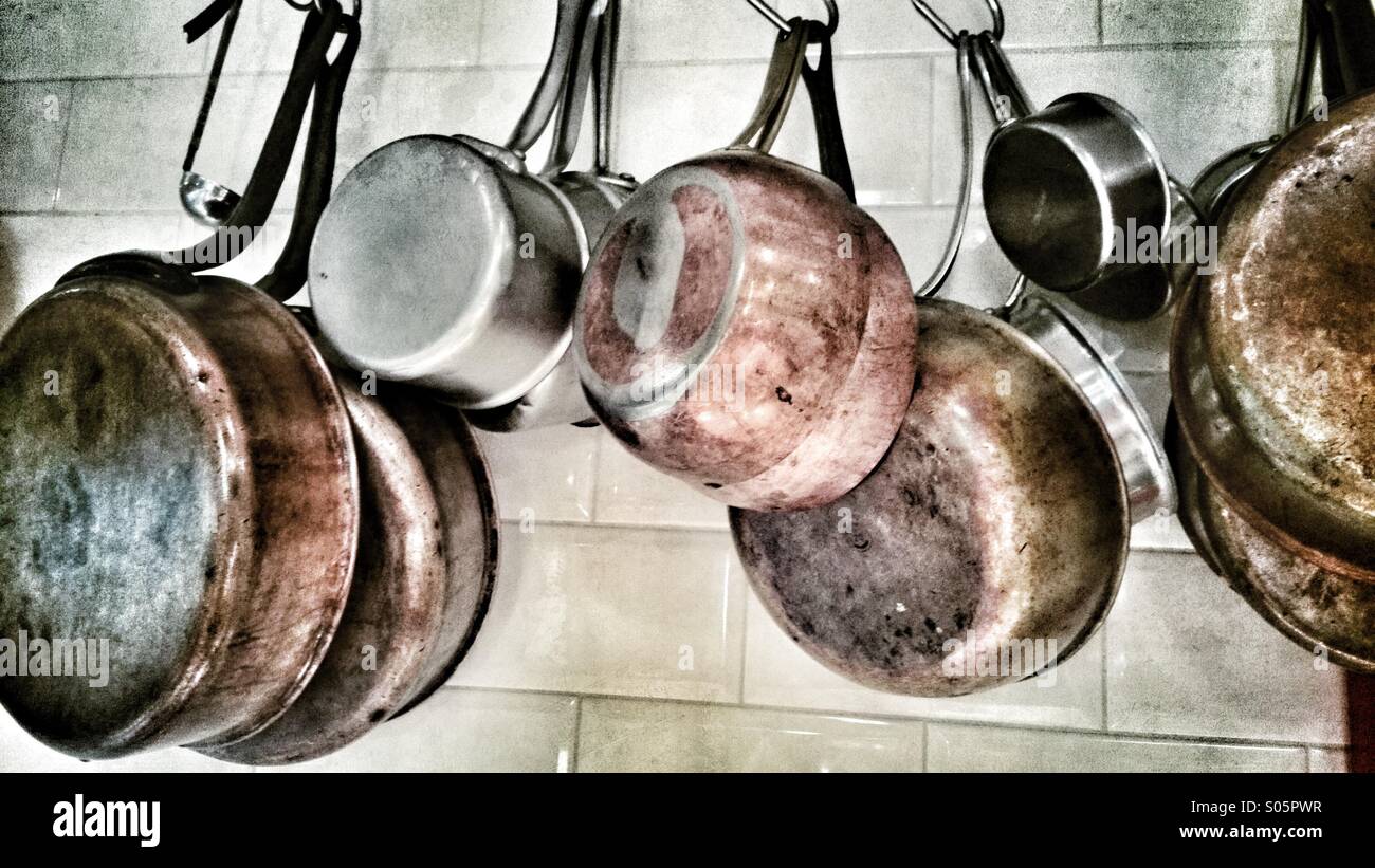 Old Pans And Cooking Pots Hanging On Wood Stock Photo - Download Image Now  - Cooking Pan, Hanging, Abandoned - iStock