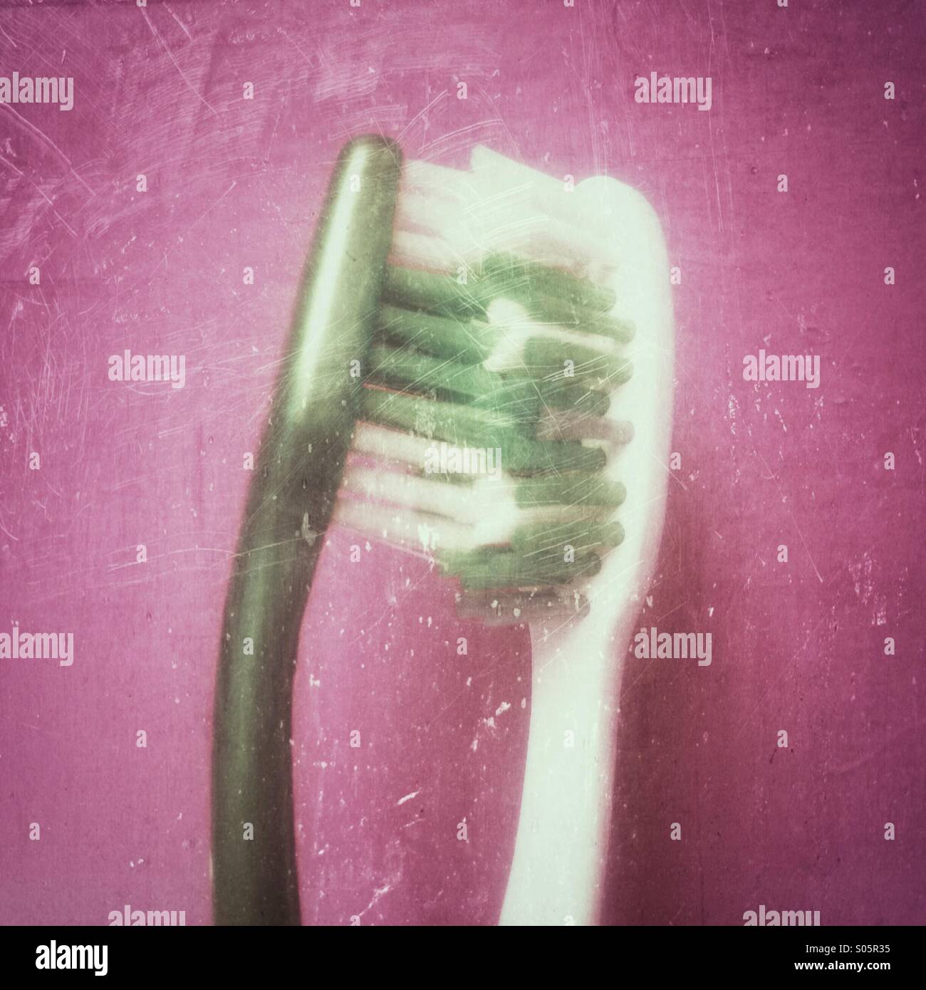 Two toothbrushes pressed together. - Smartphone Captured Stock Image