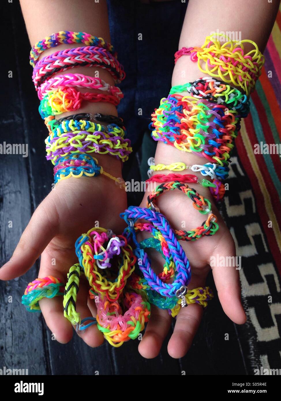 Loom bands - a young child's favourite past time Stock Photo