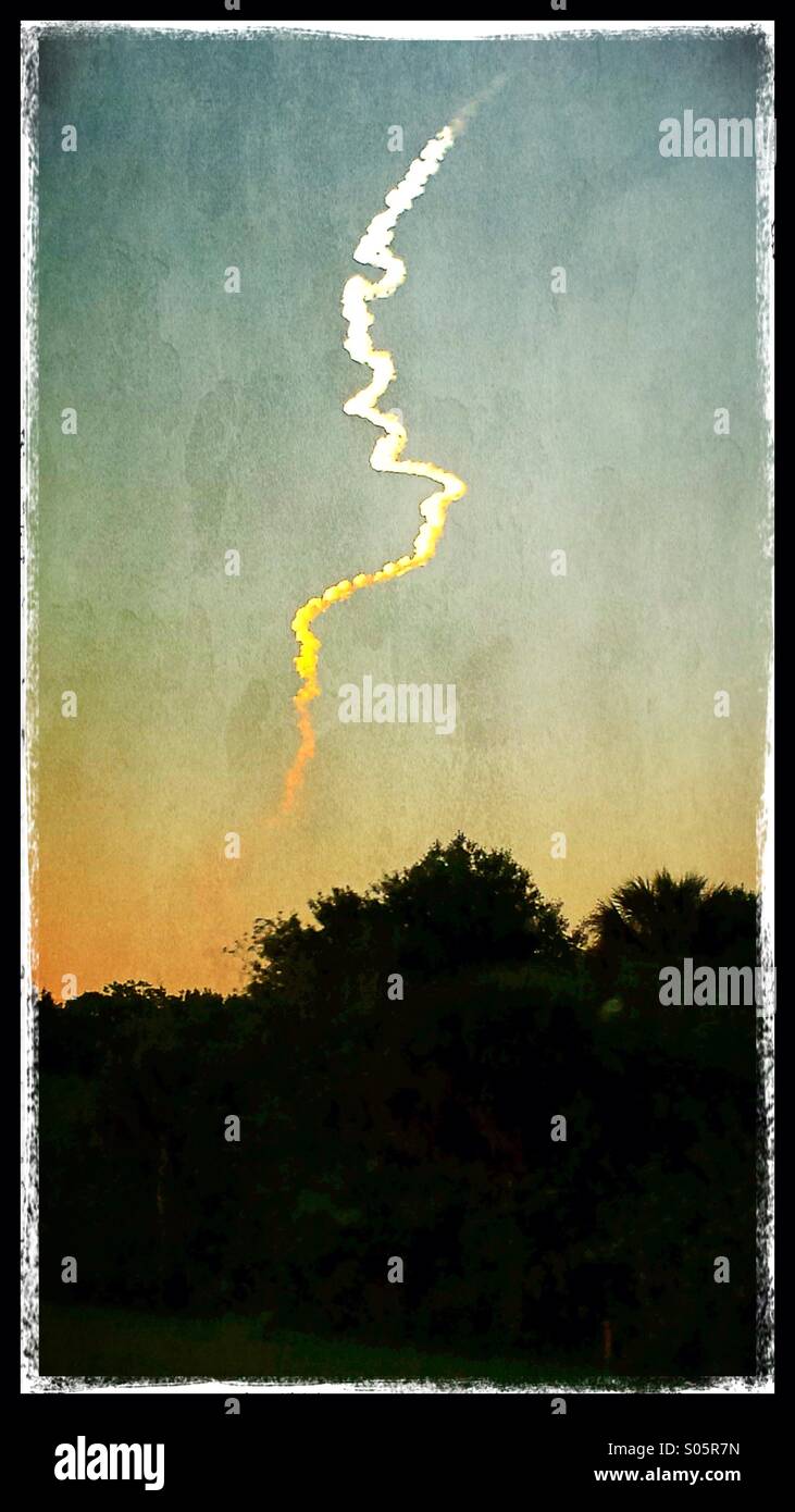Sunset rocket launch from Cape Canaveral. - Smartphone Captured Stock Image