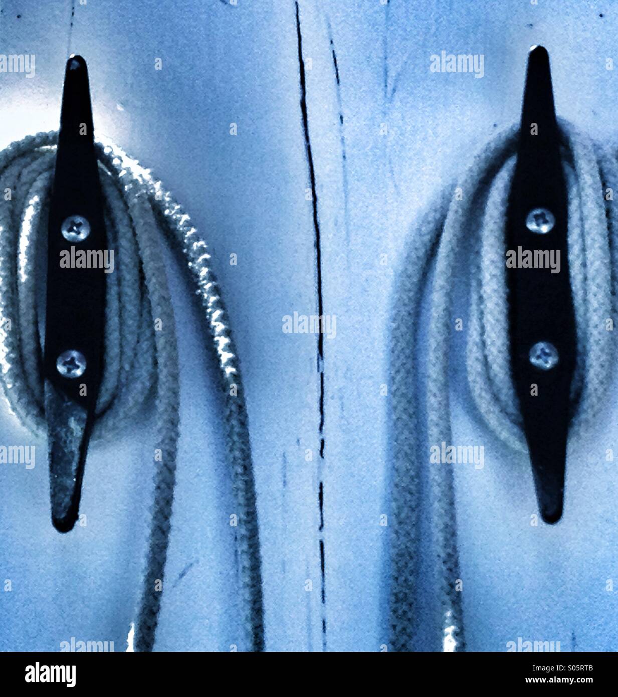 Rope coiled ruin hooks - Smartphone Captured Stock Image