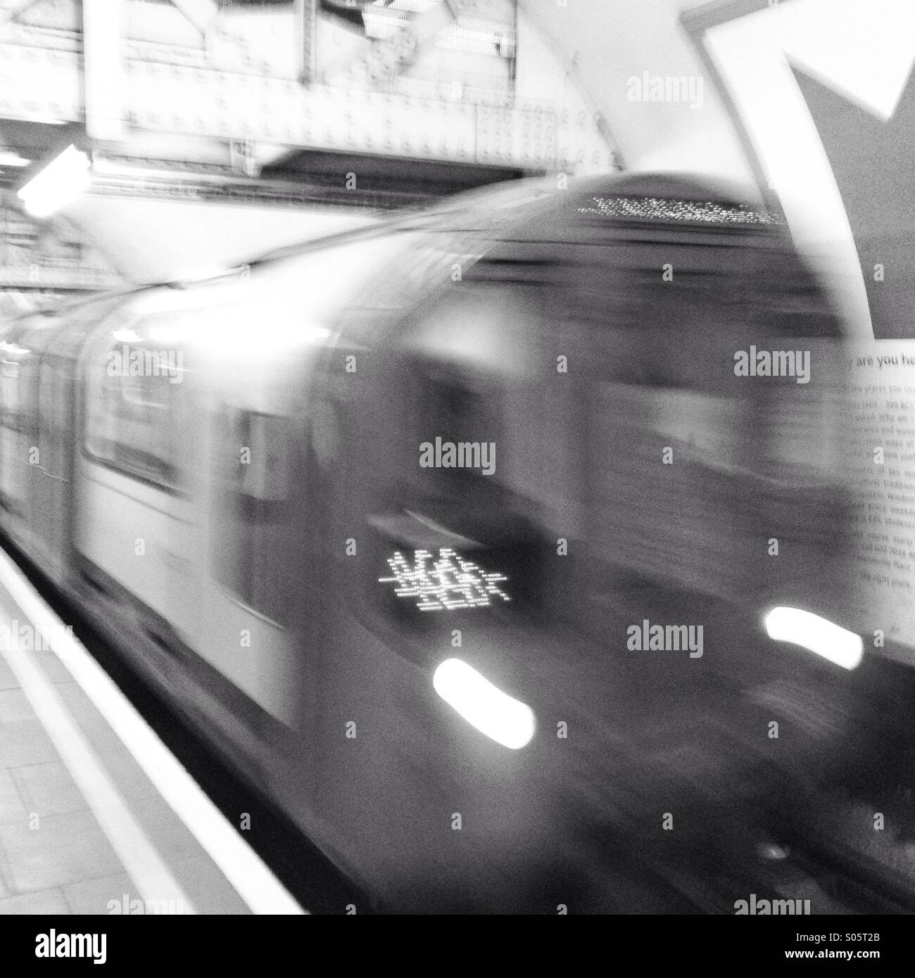 Tube train pulling into a station on the London Underground - Smartphone Captured Stock Image