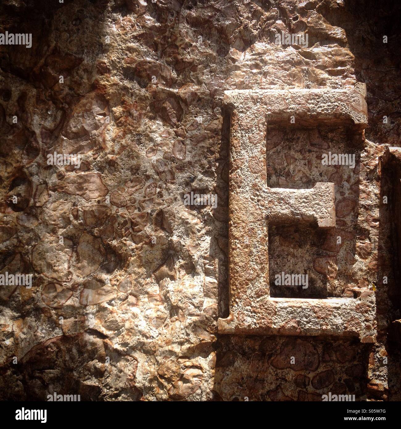 A letter E decorates an advertising in Ek Balam, Yucatan, Mexico - Smartphone Captured Stock Image
