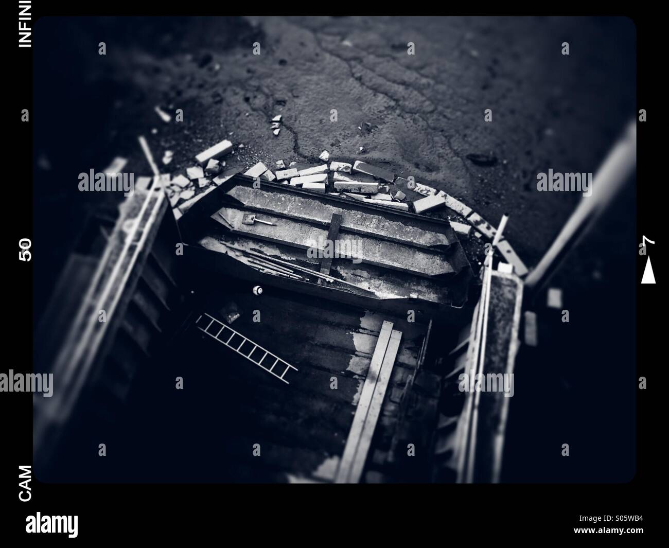 Ladder in riverside skip - Smartphone Captured Stock Image