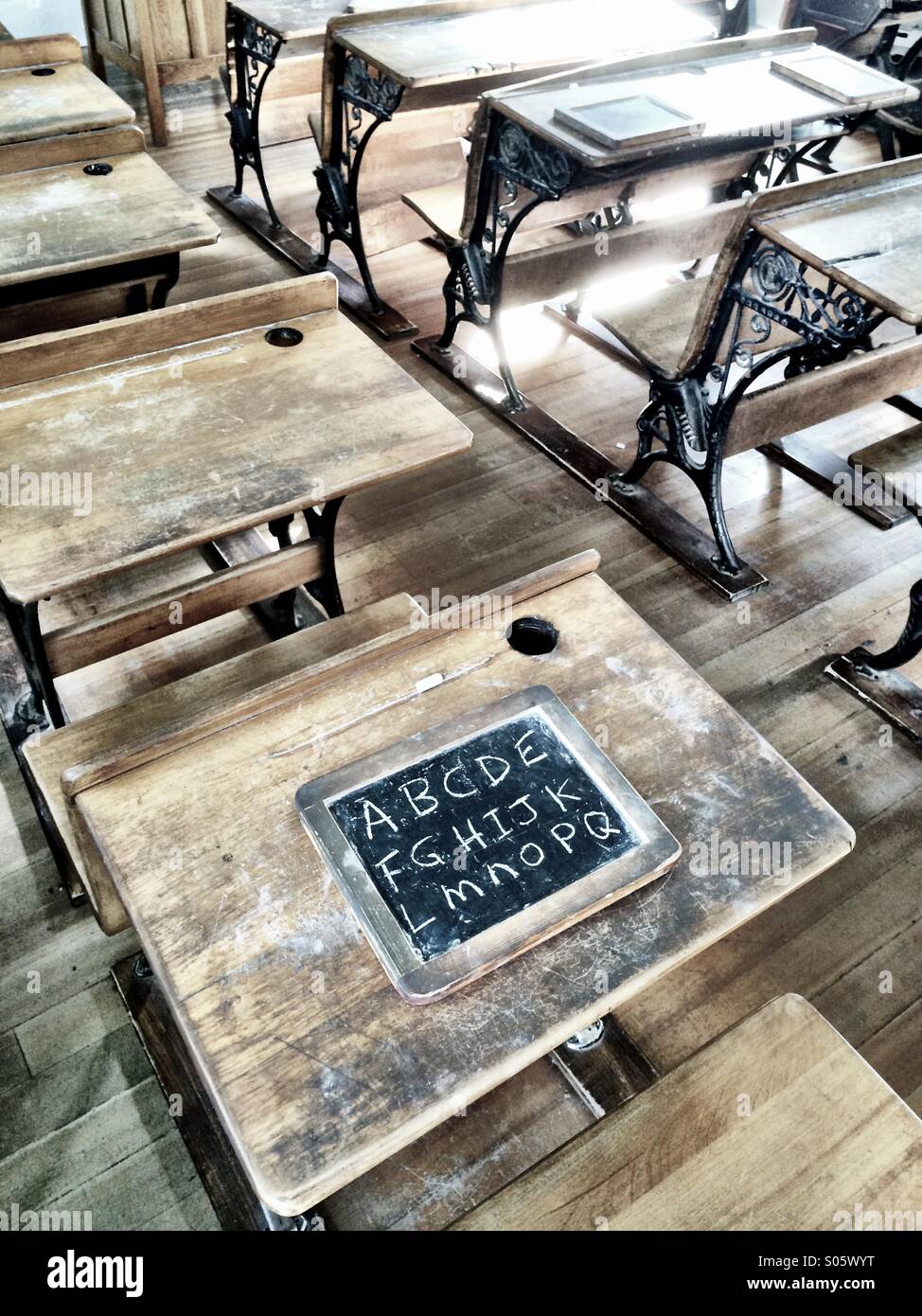 Vintage classroom with chalkboard on desk Stock Photo - Alamy