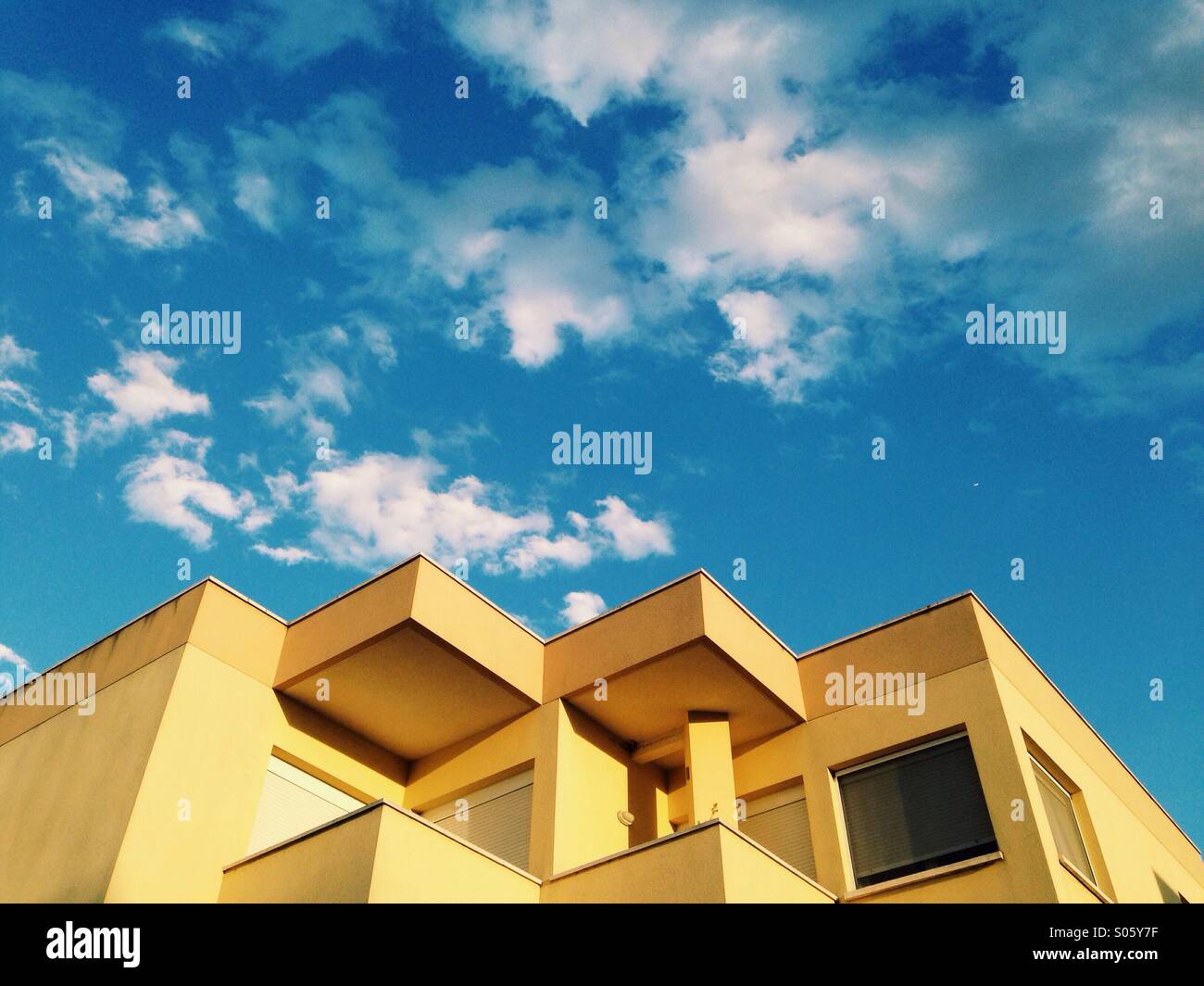 Yellow residential building Stock Photo