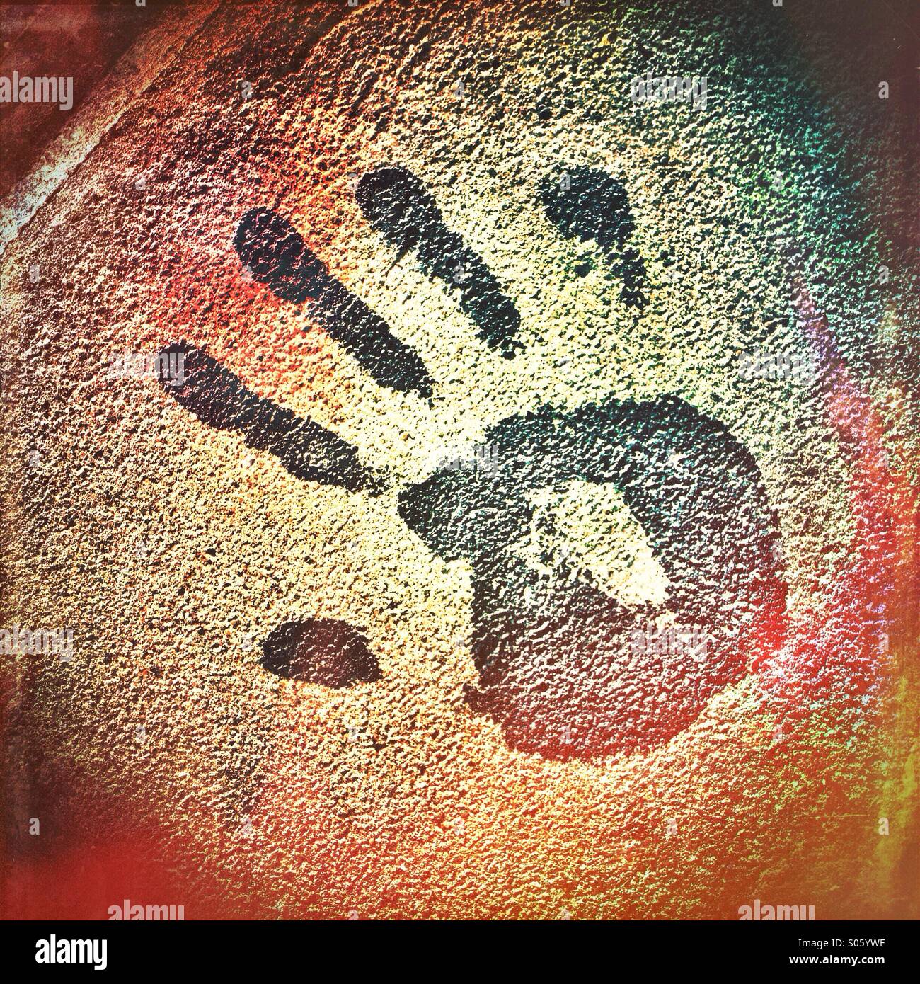 Hand print on a wall Stock Photo