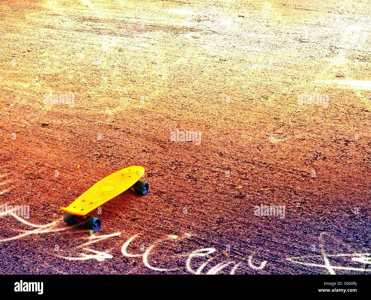 Skateboard on pavement Stock Photo Alamy