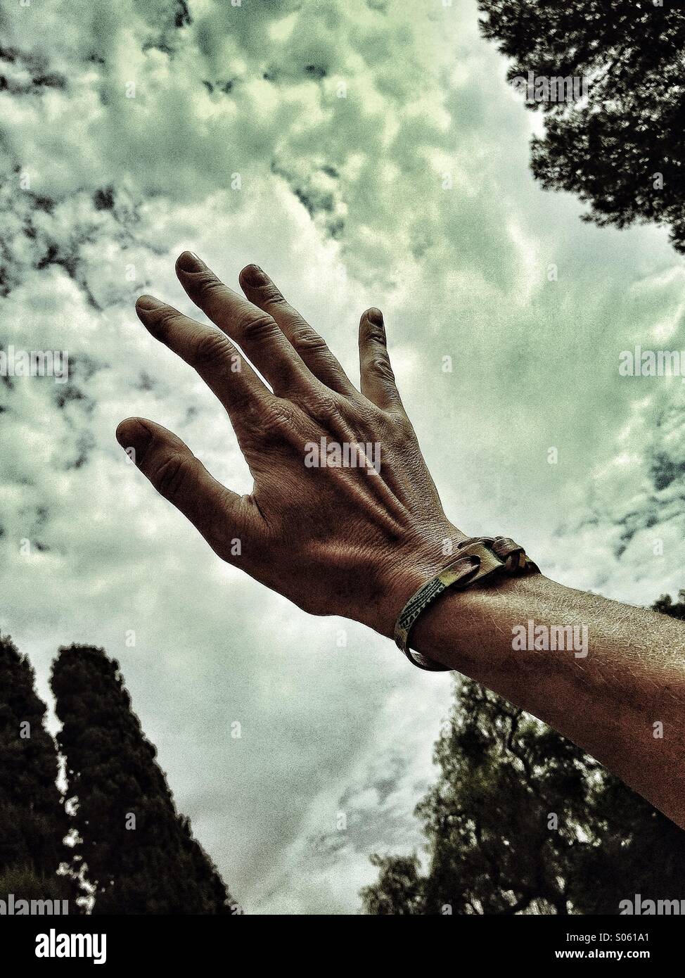 Hand reaching sky hi-res stock photography and images - Alamy