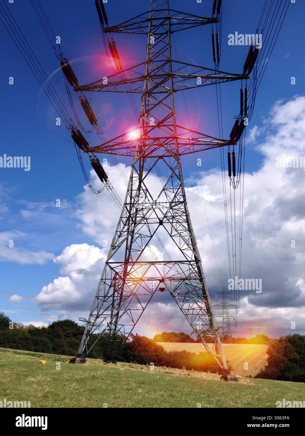 Electricity pylon with glowing orbs overlaid - Smartphone Captured Stock Image