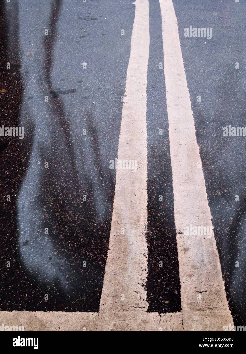 Double white lines on road - Smartphone Captured Stock Image