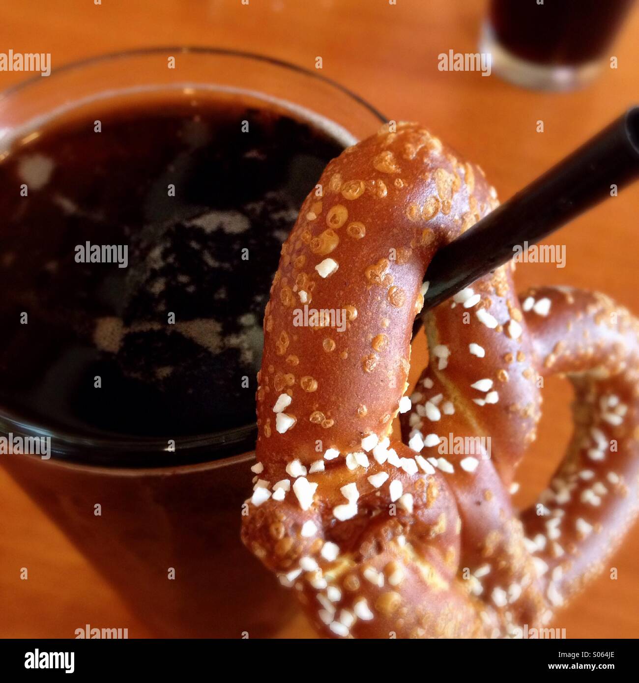Root beer and a pretzel. - Smartphone Captured Stock Image