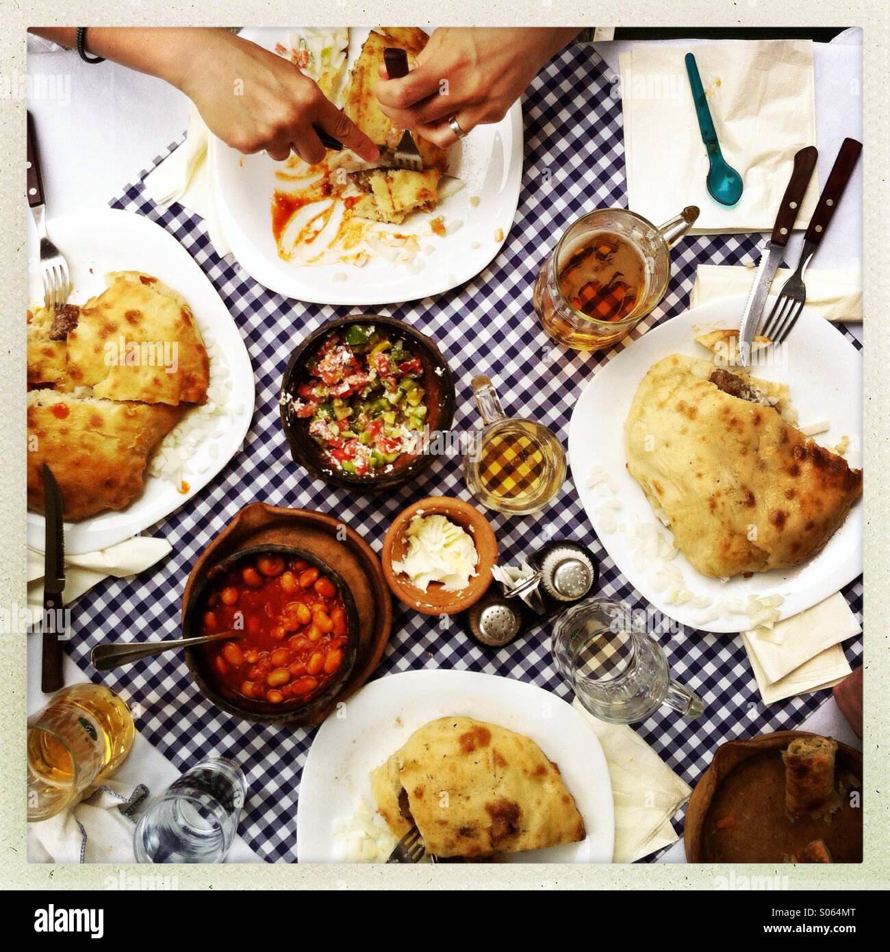 Table full of Balkan food, shot from above Stock Photo