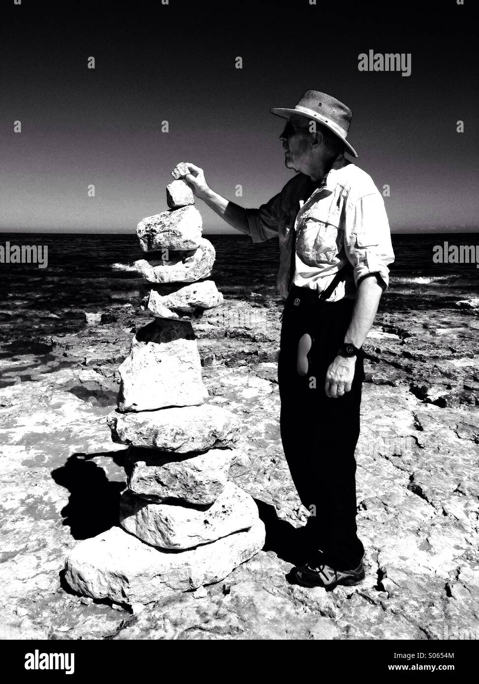 Rock art by the lake shore - Smartphone Captured Stock Image