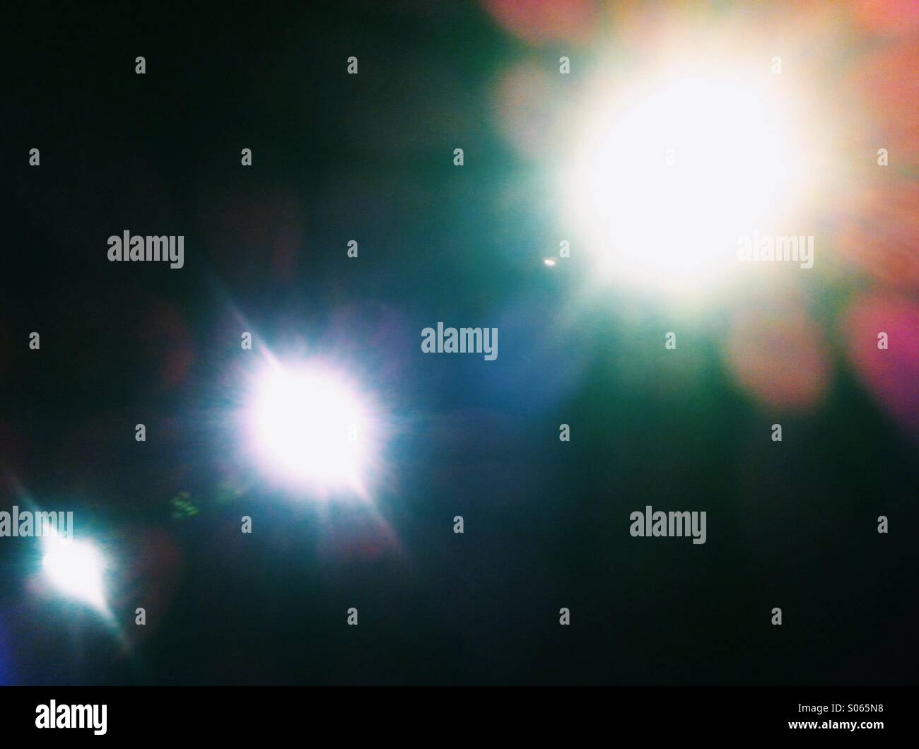Bright spotlights with lens flare - Smartphone Captured Stock Image