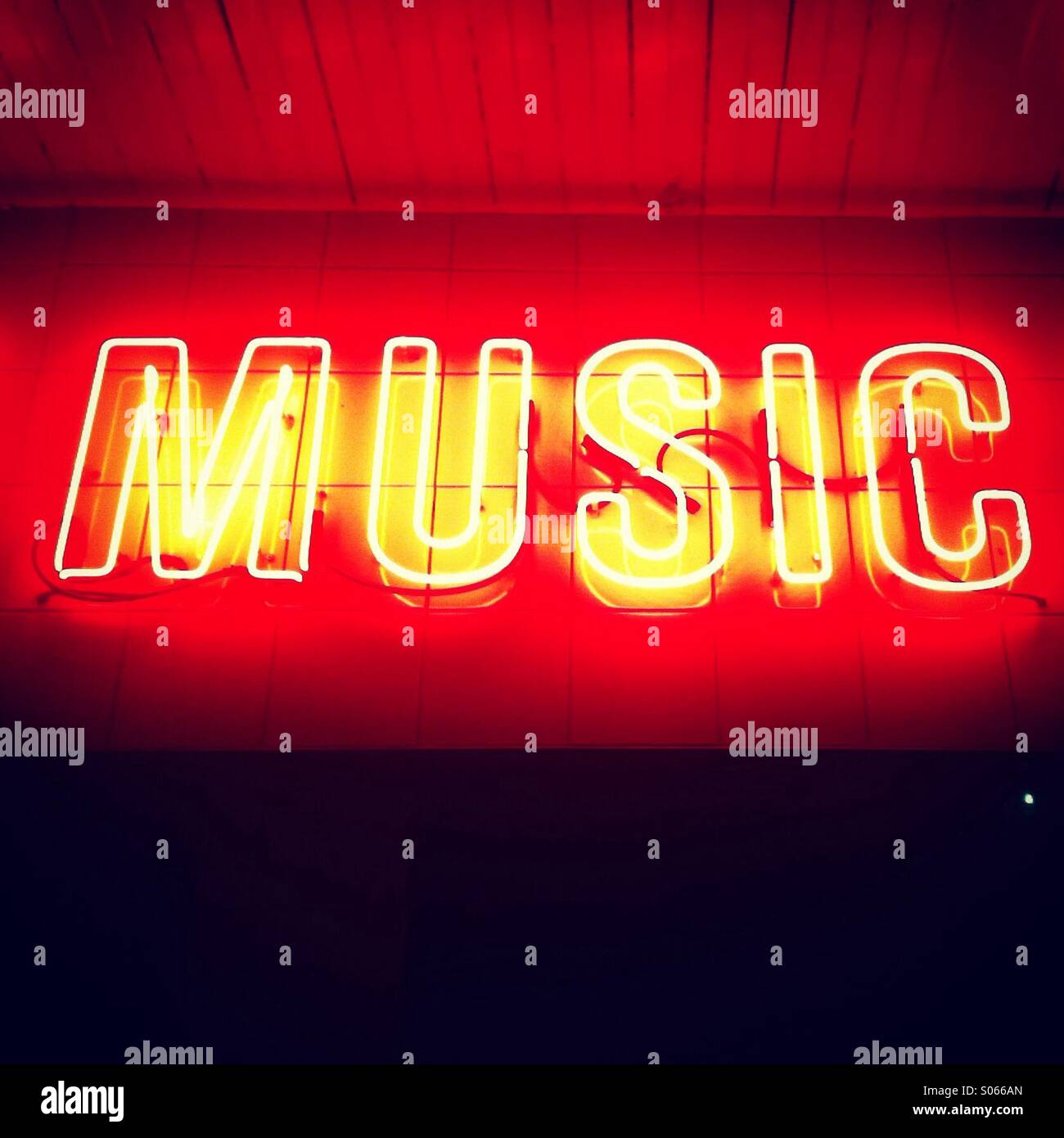 Music written in Neon lights Stock Photo