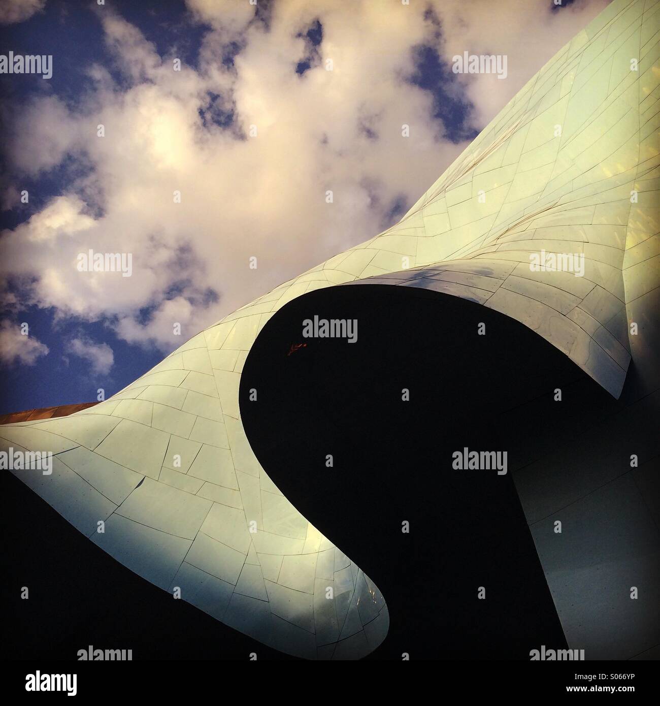 Clouds over EMP, Experience Music Project, designed by architect Frank Gehry, Seattle Center, Seattle, Washington - Smartphone Captured Stock Image