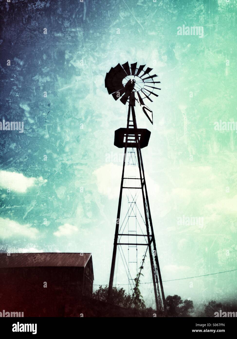 A windmill with blue skies. - Smartphone Captured Stock Image