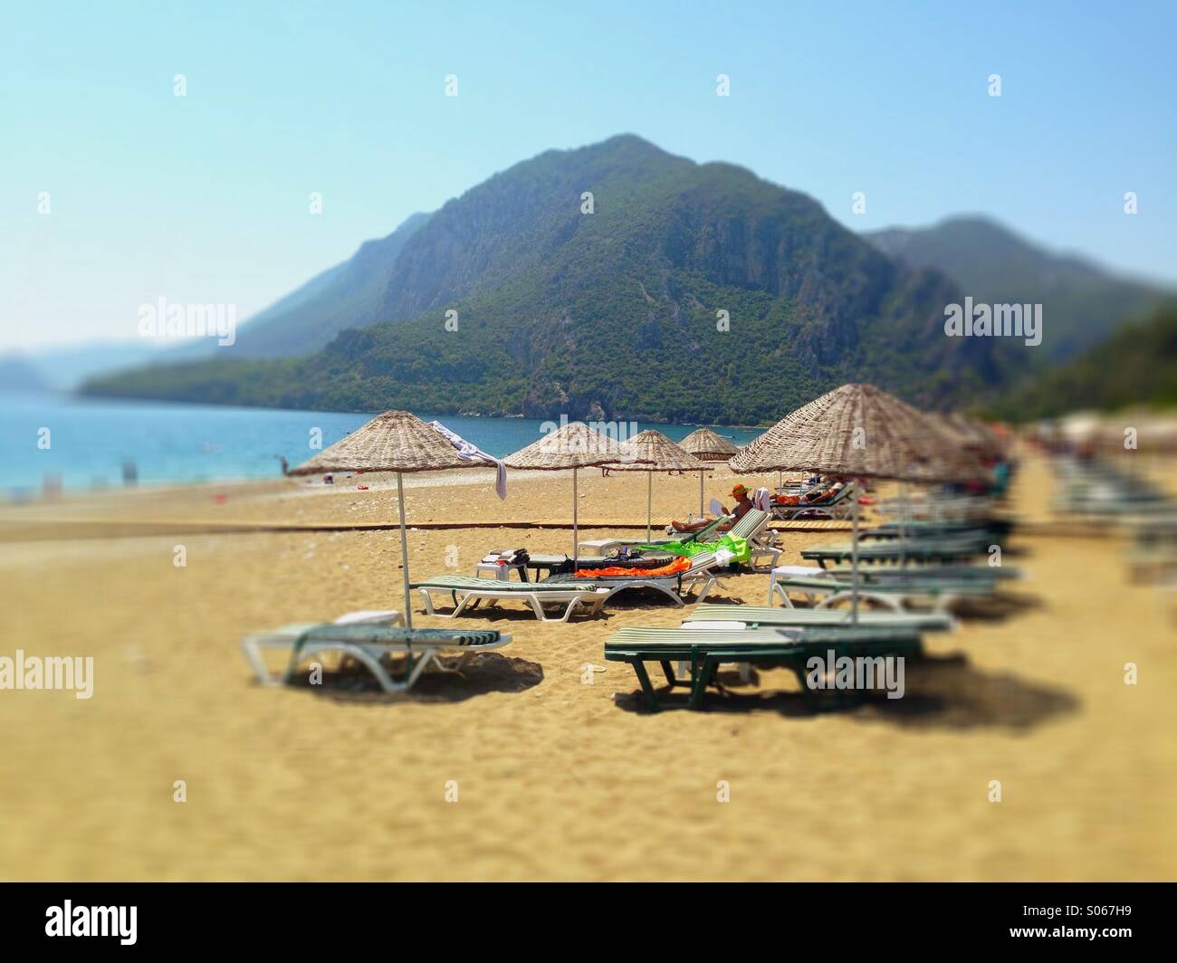 Loungers on Cerali Beach, Mediterranean resort, Turkey Stock Photo
