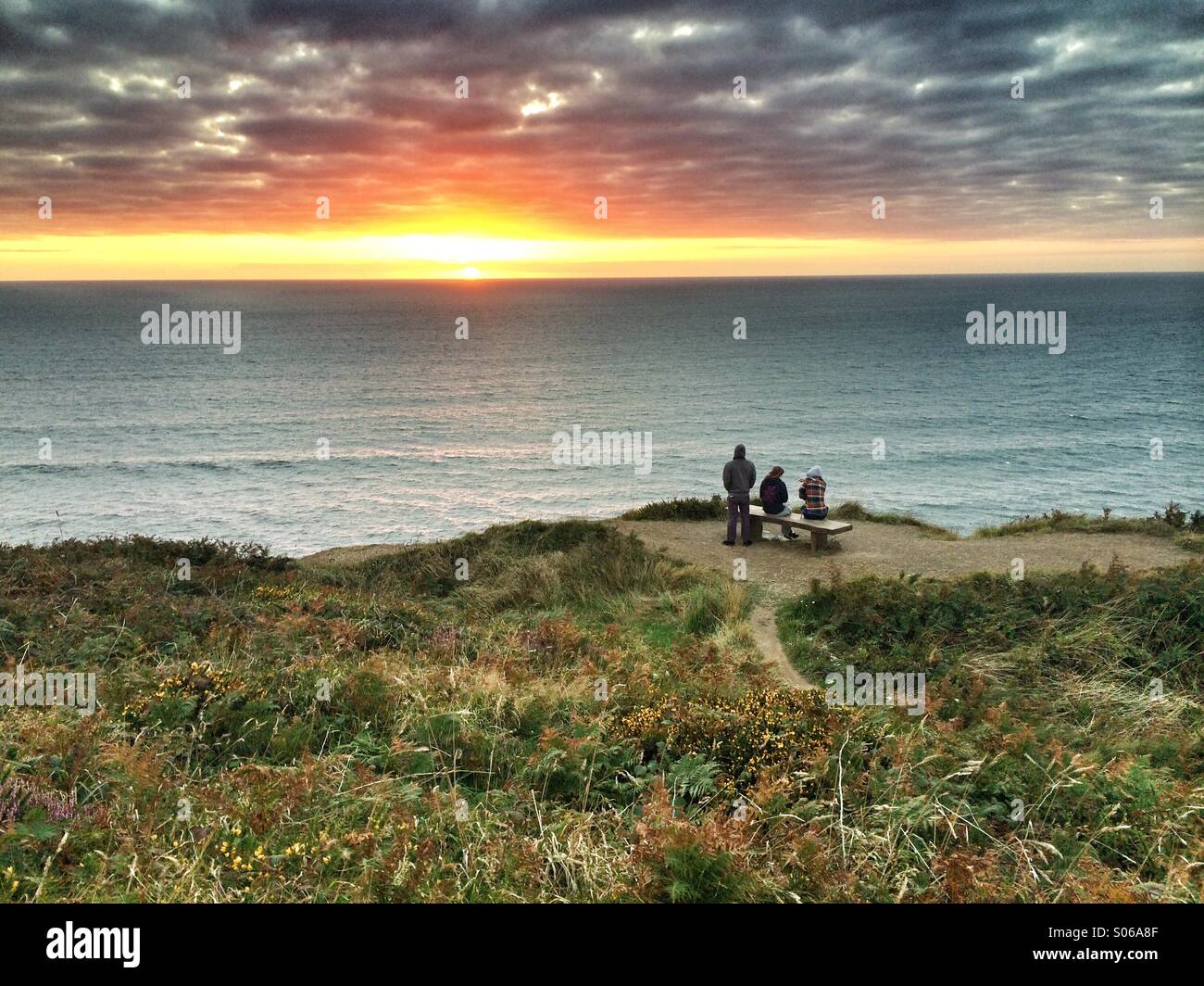 Watching the sunset in Cornwall - Smartphone Captured Stock Image