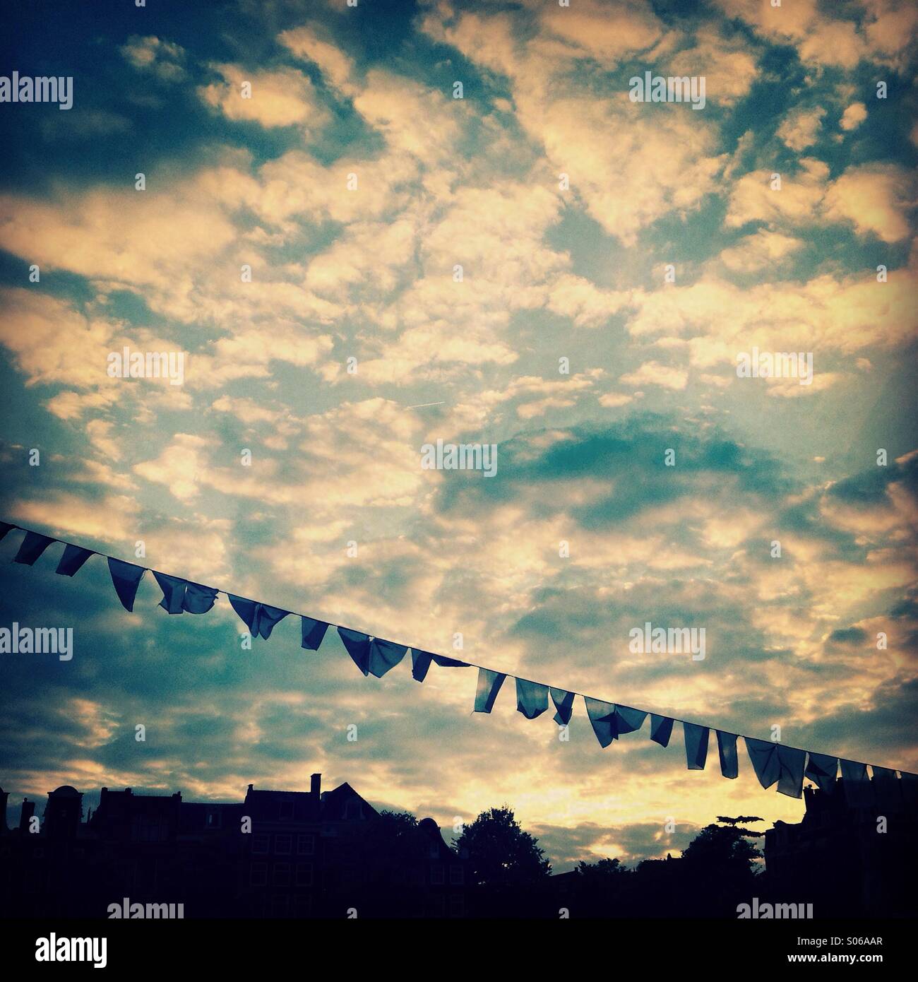 Silhouette of Tibetan flags at sunset Stock Photo