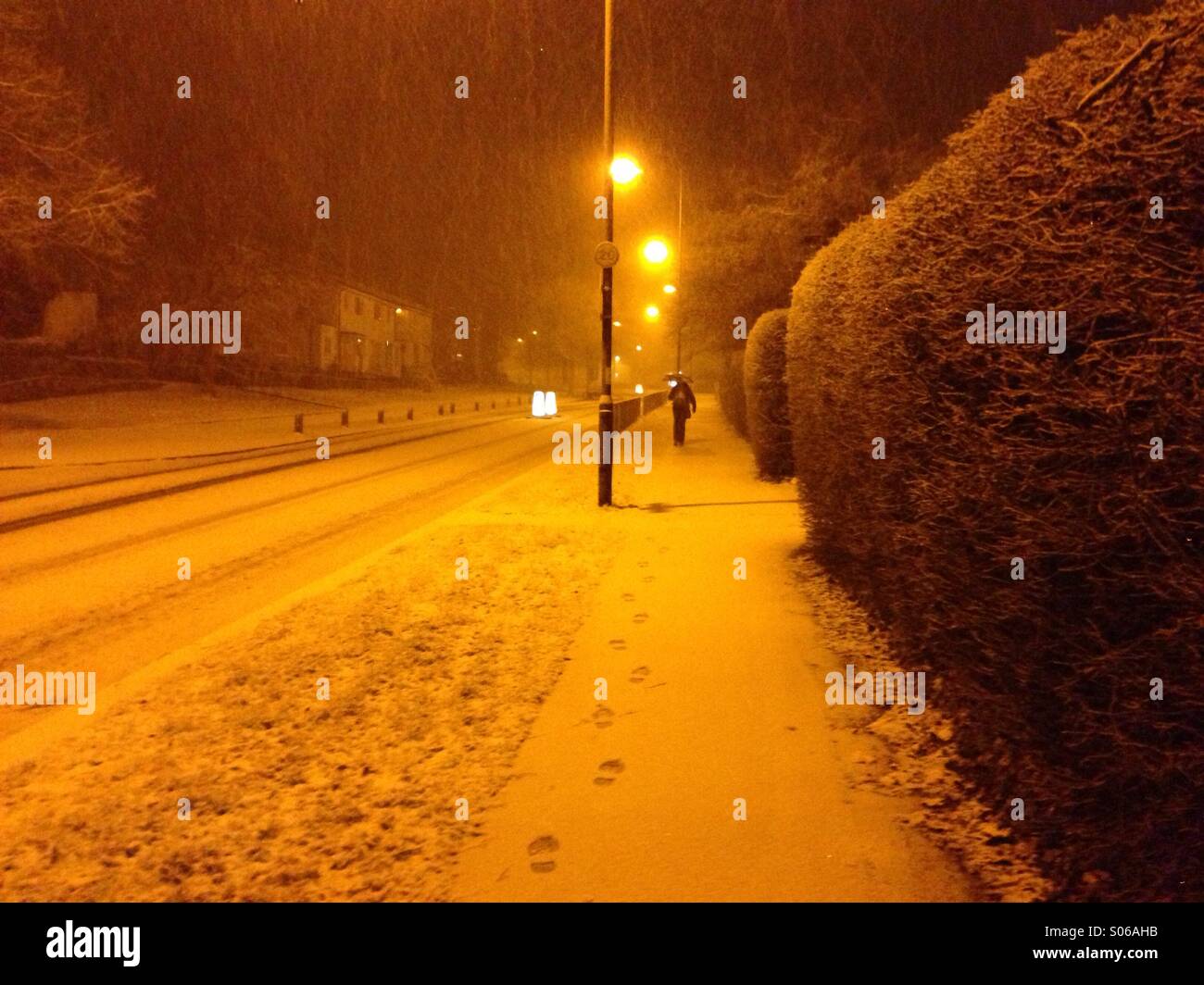 Snow covered road Stock Photo Alamy